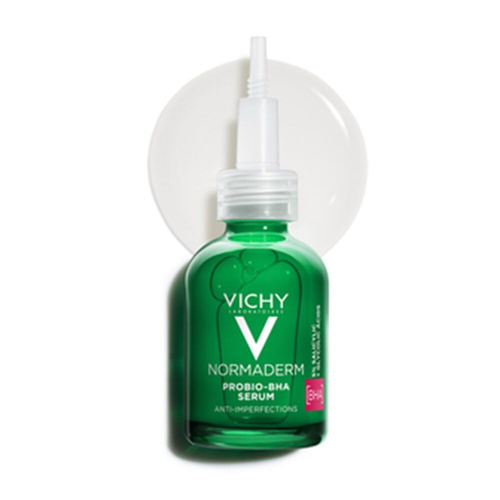 Groene Vichy Normaderm serumfles met pipet. Op witte achtergrond. Vichy-logo zichtbaar.