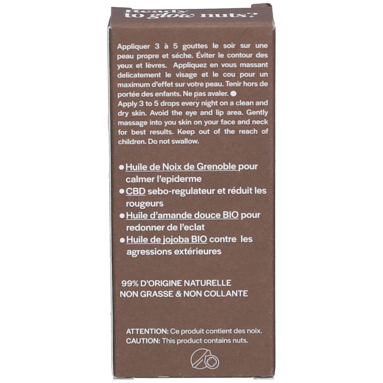 Bruine verpakking. Tekst: Gebruiksaanwijzing, ingrediënten, 99% natuurlijke oorsprong. Tekst in het Frans.