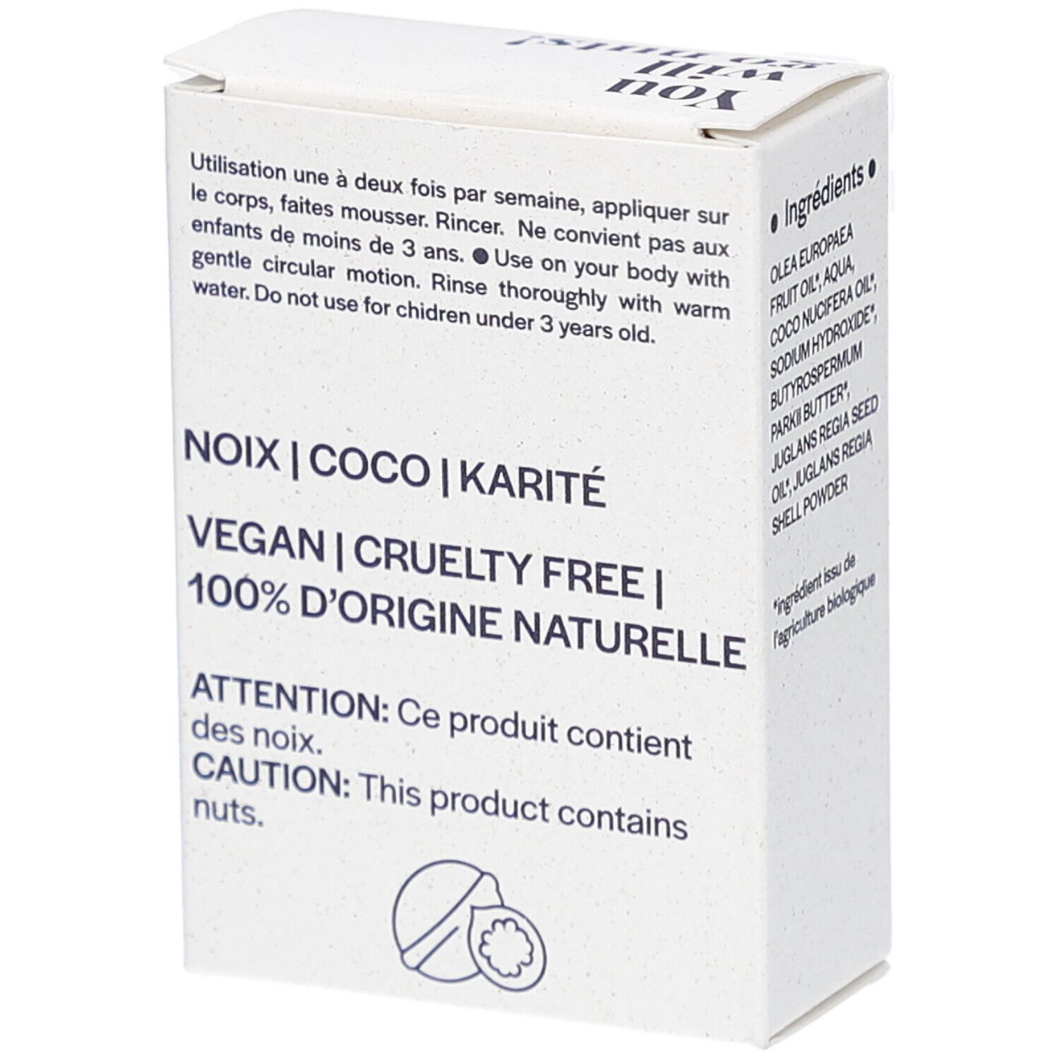 Witte kartonnen verpakking. Opschrift: NOIX | COCO | KARITÉ, VEGAN | CRUELTY FREE | 100% D'ORIGINE NATURELLE. Bevat noten. Gebruiksaanwijzing.