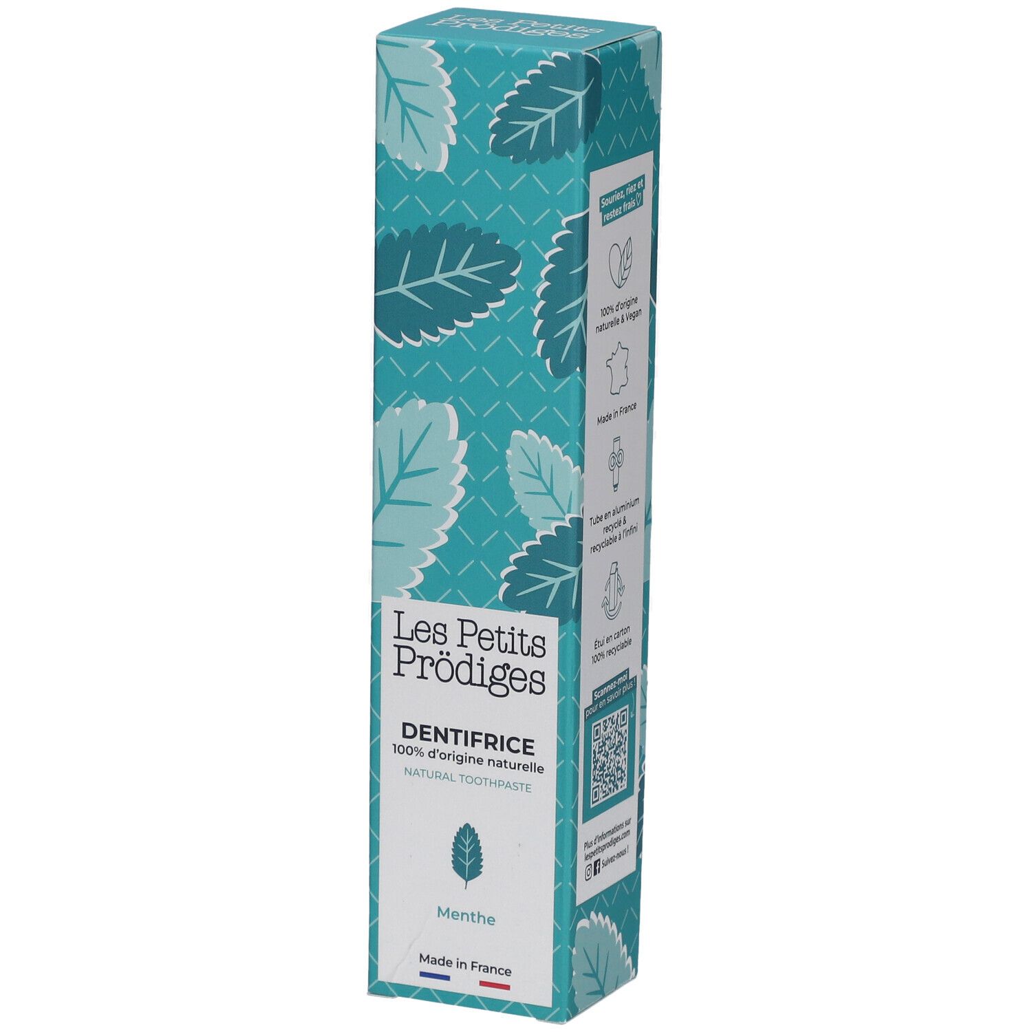 Emballage de dentifrice avec motif de feuilles bleues. Texte: Les Petits Prodiges, DENTIFRICE, Menthe. Fabriqué en France.
