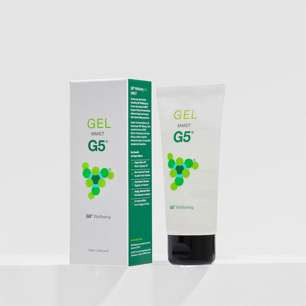 Tube et emballage blancs. Inscription: GEL MMST G5. Logo: cercles verts. Fermeture noire.