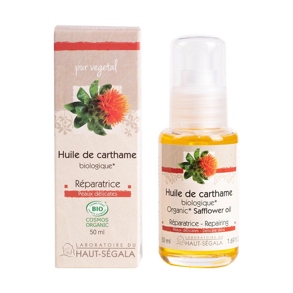 Fles en doosje met biologische saffloerolie. Opschrift: Réparatrice, Peaux délicates. Bio-label.