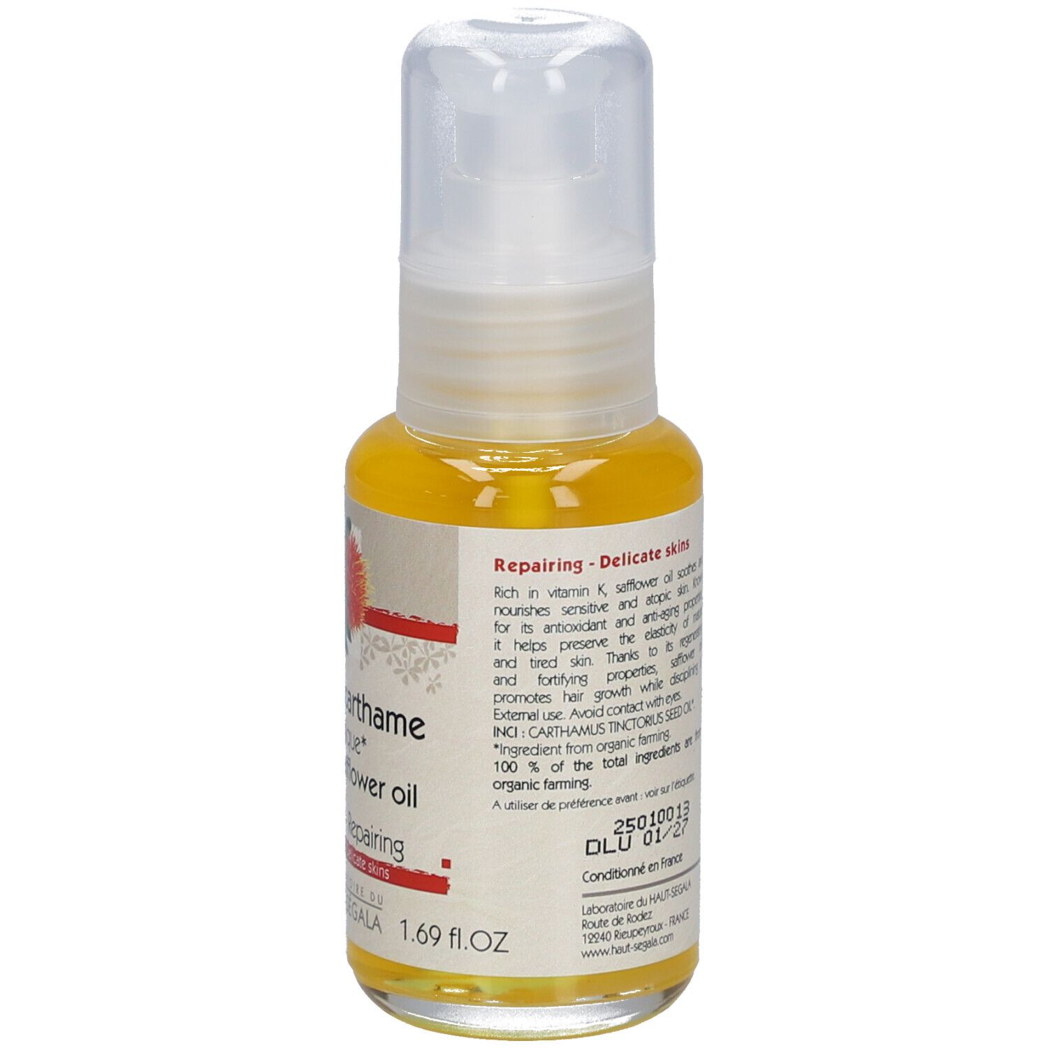 Achterkant van het flesje biologische saffloerolie. Opschrift: Réparatrice, Peaux délicates. Bio-label.