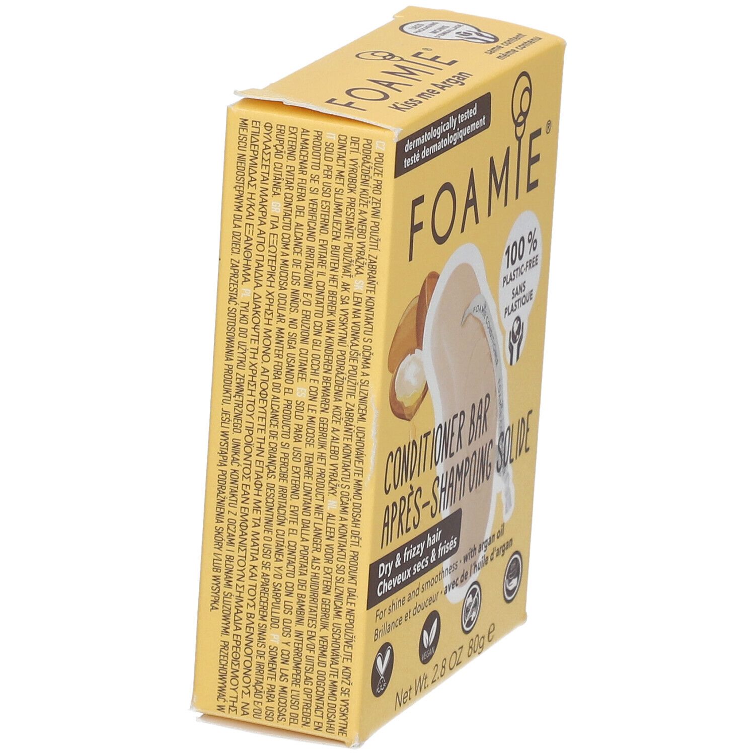 Boîte jaune FOAMIE Kiss me Argan. Après-shampoing solide pour cheveux secs et frisés. Vue latérale.