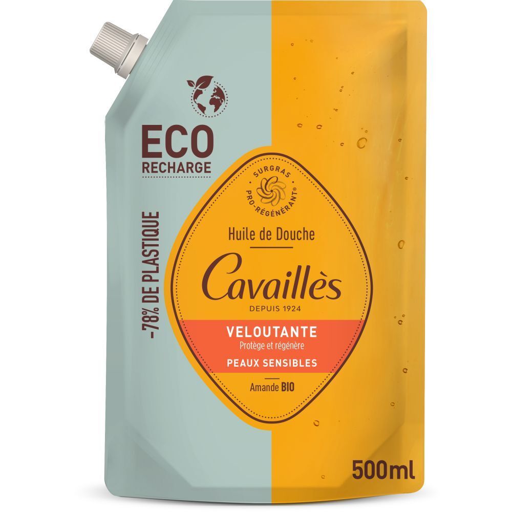 Recharge d'huile de douche. Emballage bleu clair et jaune avec nom et logo du produit. Contient 500ml. Avec certifications.