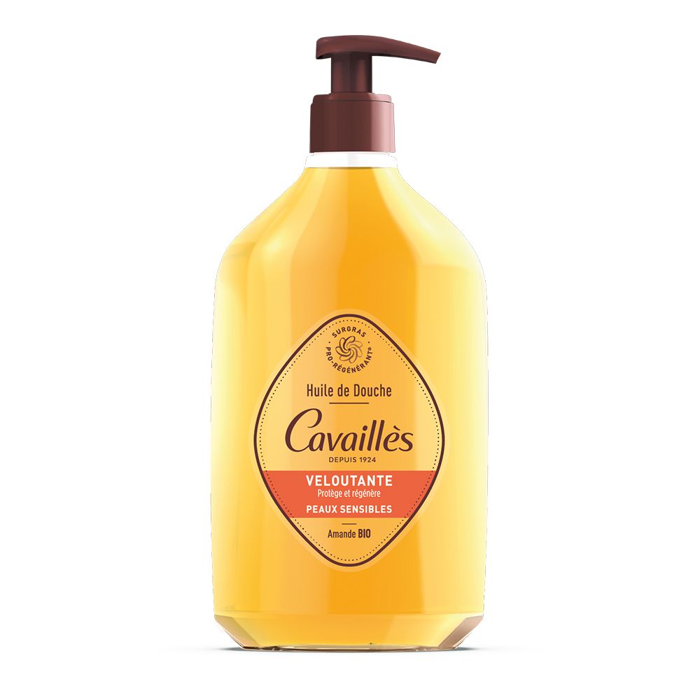 Flacon avec pompe marron. Étiquette avec nom du produit et texte. Liquide ambré.