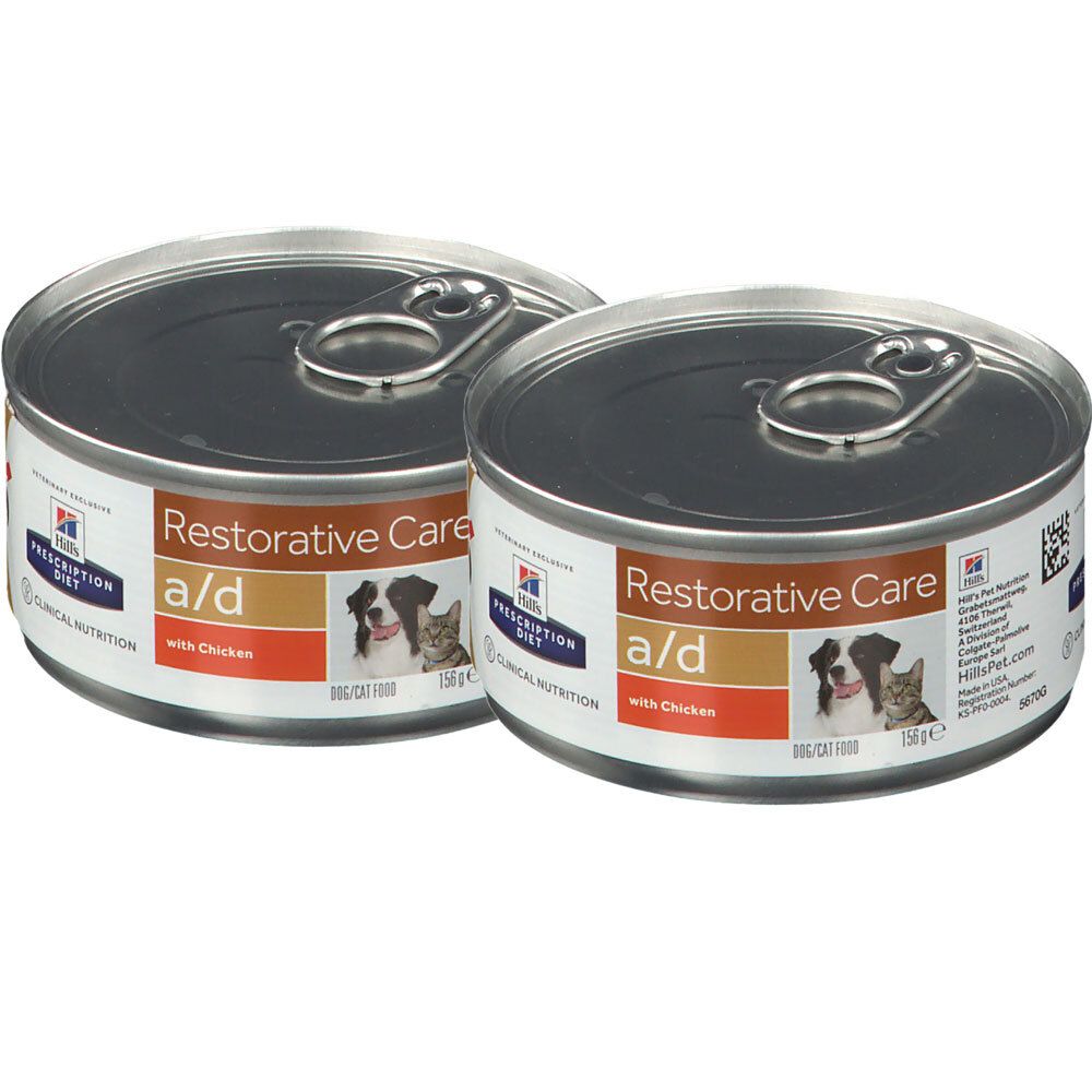 Deux boîtes de Hills Prescription Diet Restorative Care a/d avec du poulet. Inscription : DOG/CAT FOOD. Image d'un chien et d'un chat.