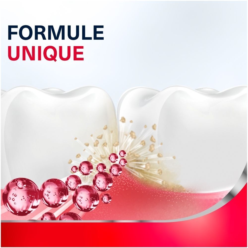 Gros plan d'une dent, cercles rouges avec particules, "4x plus efficace".