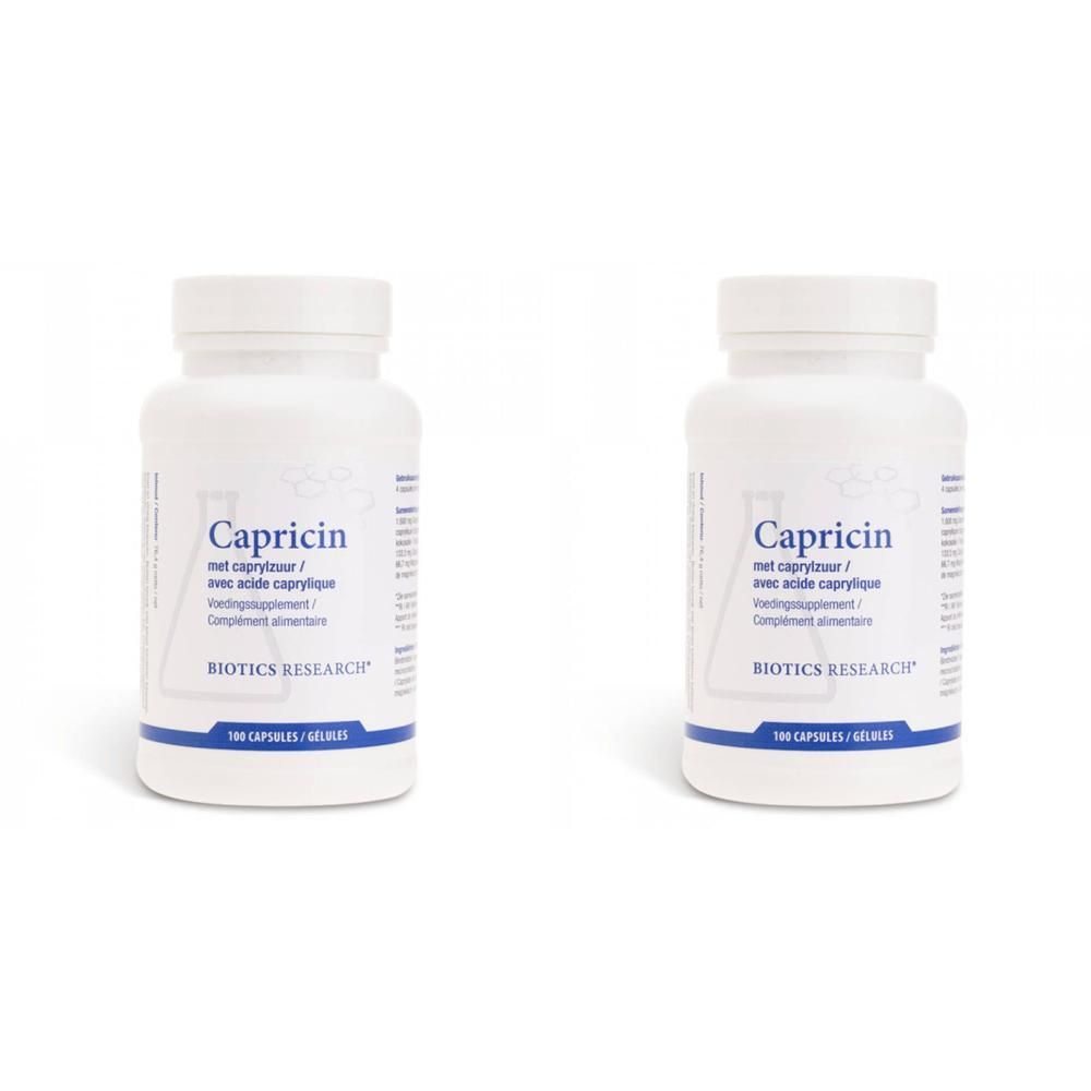 Twee witte flessen Biotika Capricin, elk met 100 capsules.