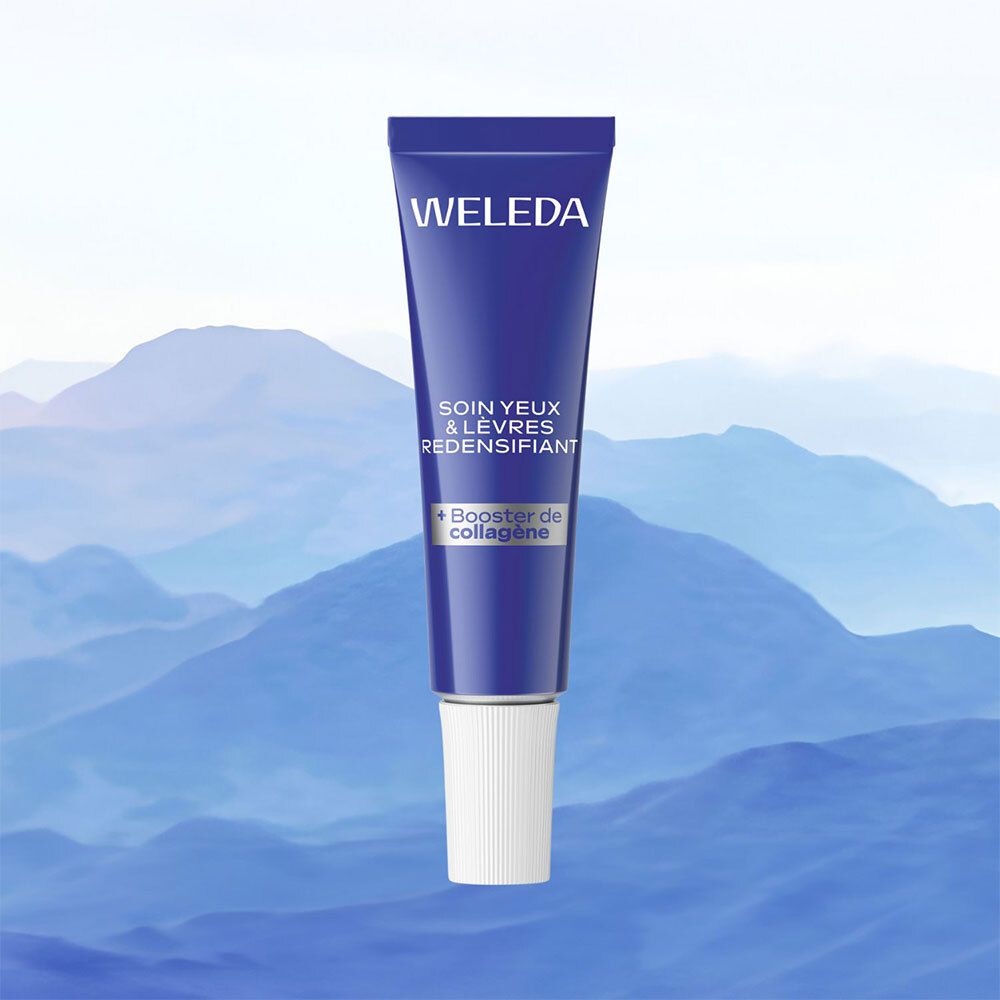 Blauwe tube met witte dop. Achtergrond: bergen. Opschrift: WELEDA, SOIN YEUX & LÈVRES REDENSIFIANT, + Booster de collagène.