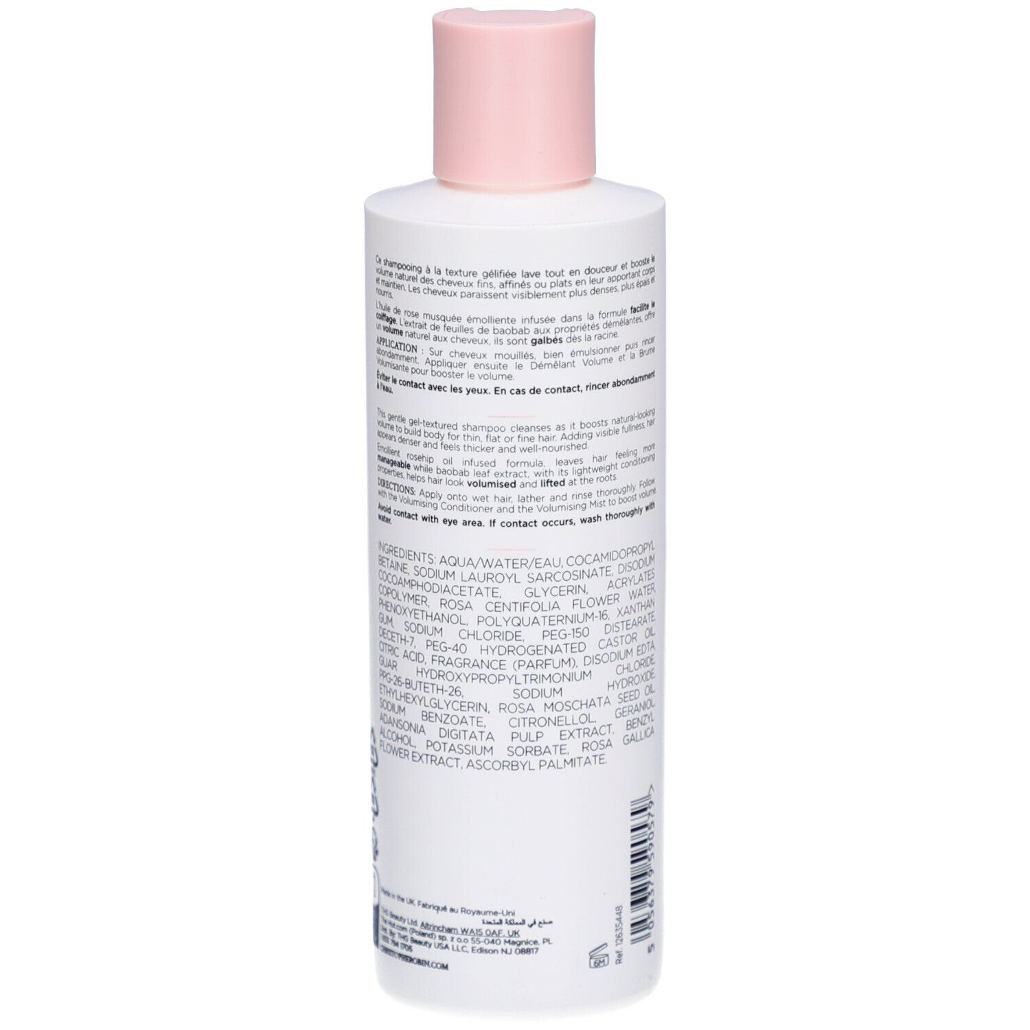 Achterkant van een witte fles met roze dop. Tekst en ingrediënten in meerdere talen. Streepjescode en productie-informatie.