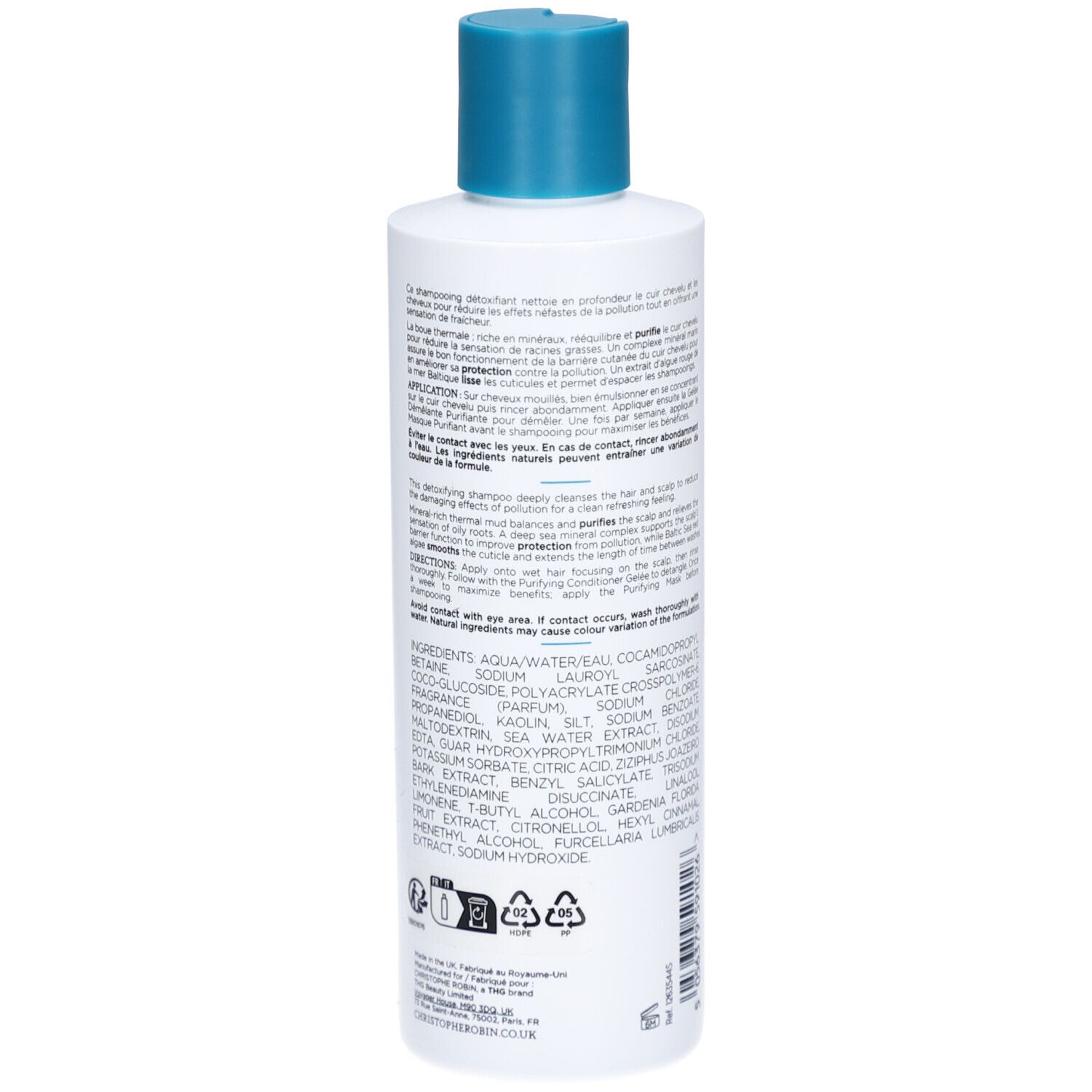 Achterkant van de shampoo fles. Meertalige tekst, ingrediënten en fabrikant informatie.