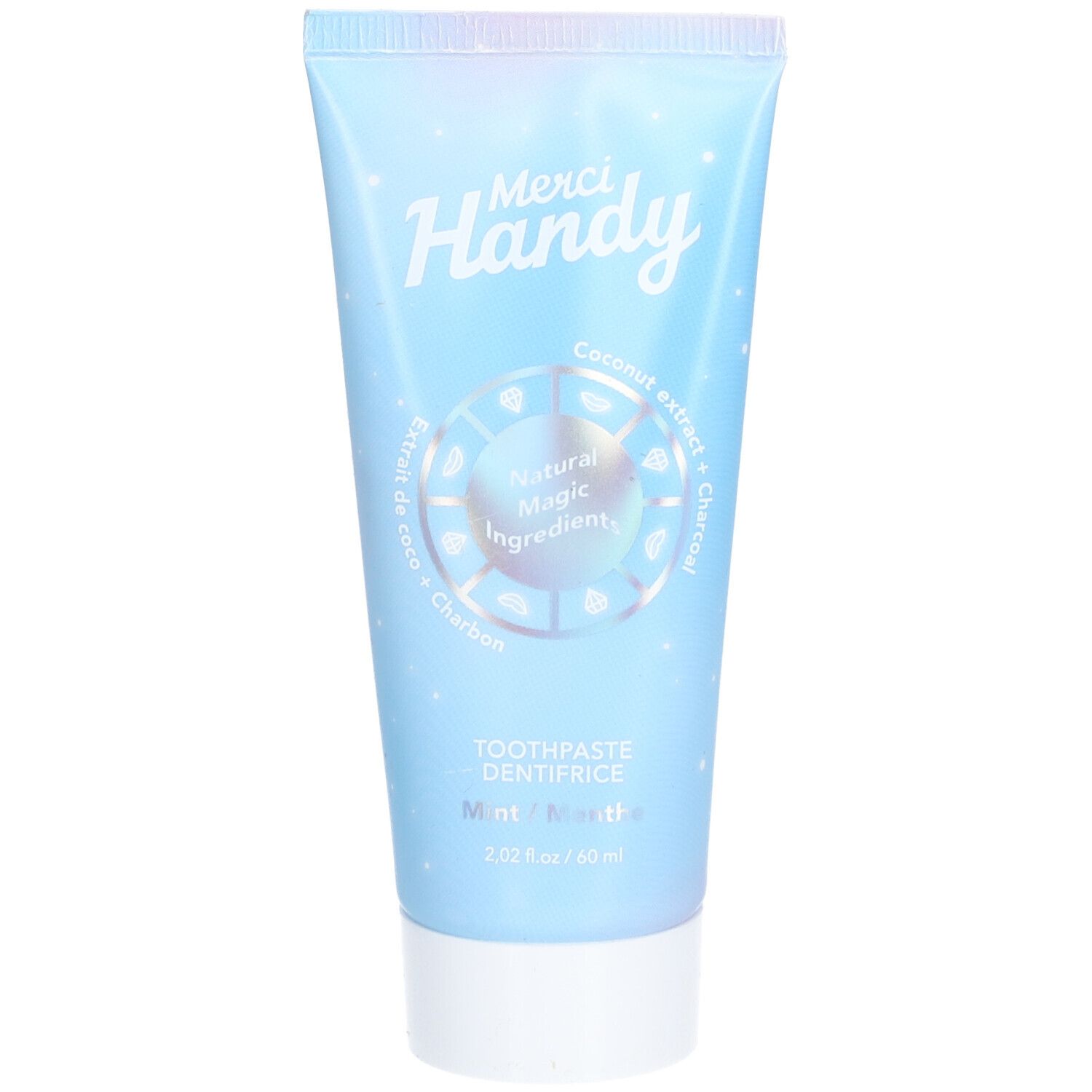 Tube bleu clair Merci Handy. Contient extrait de noix de coco et charbon actif. Inscription: Toothpaste Dentifrice Mint/Menthe.