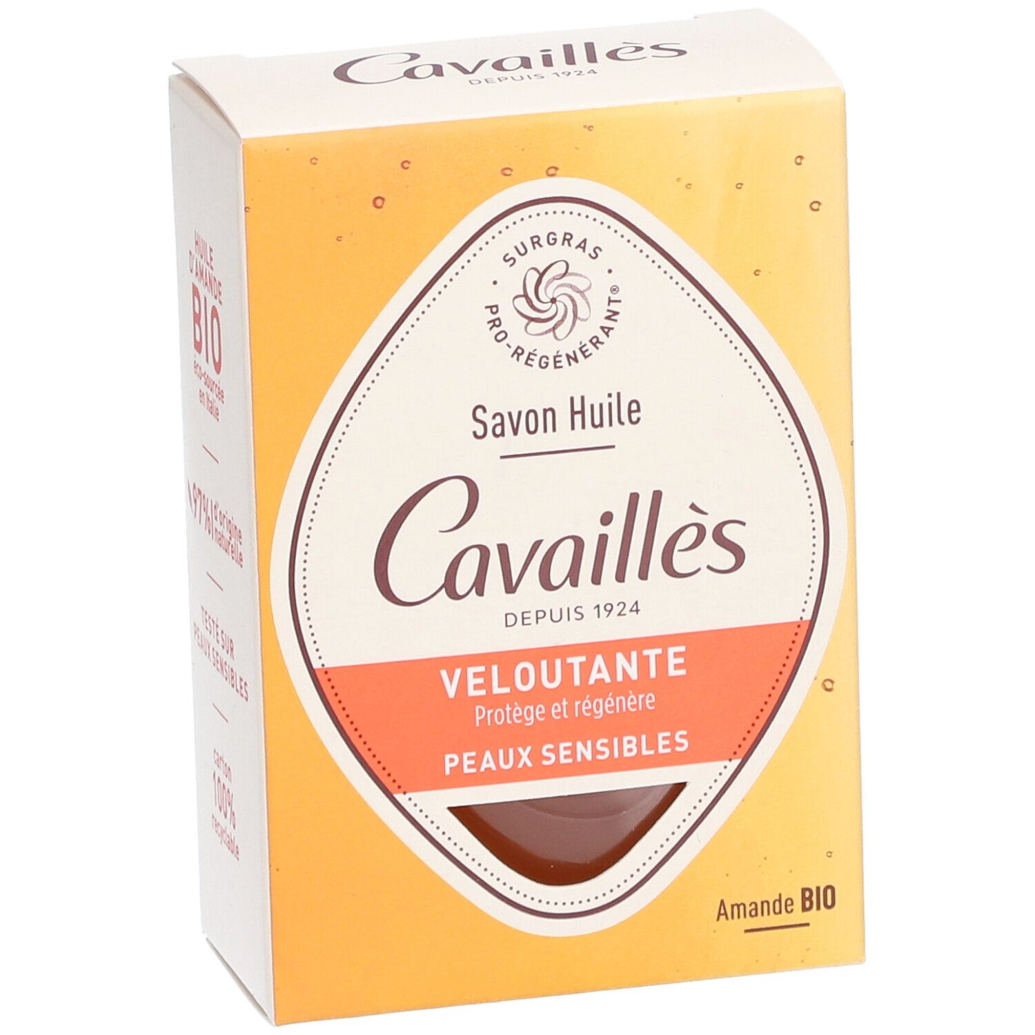 Boîte en carton, légèrement en biais. Inscriptions: Cavaillès, Savon Huile, Veloutante, Peaux sensibles, Amande BIO.