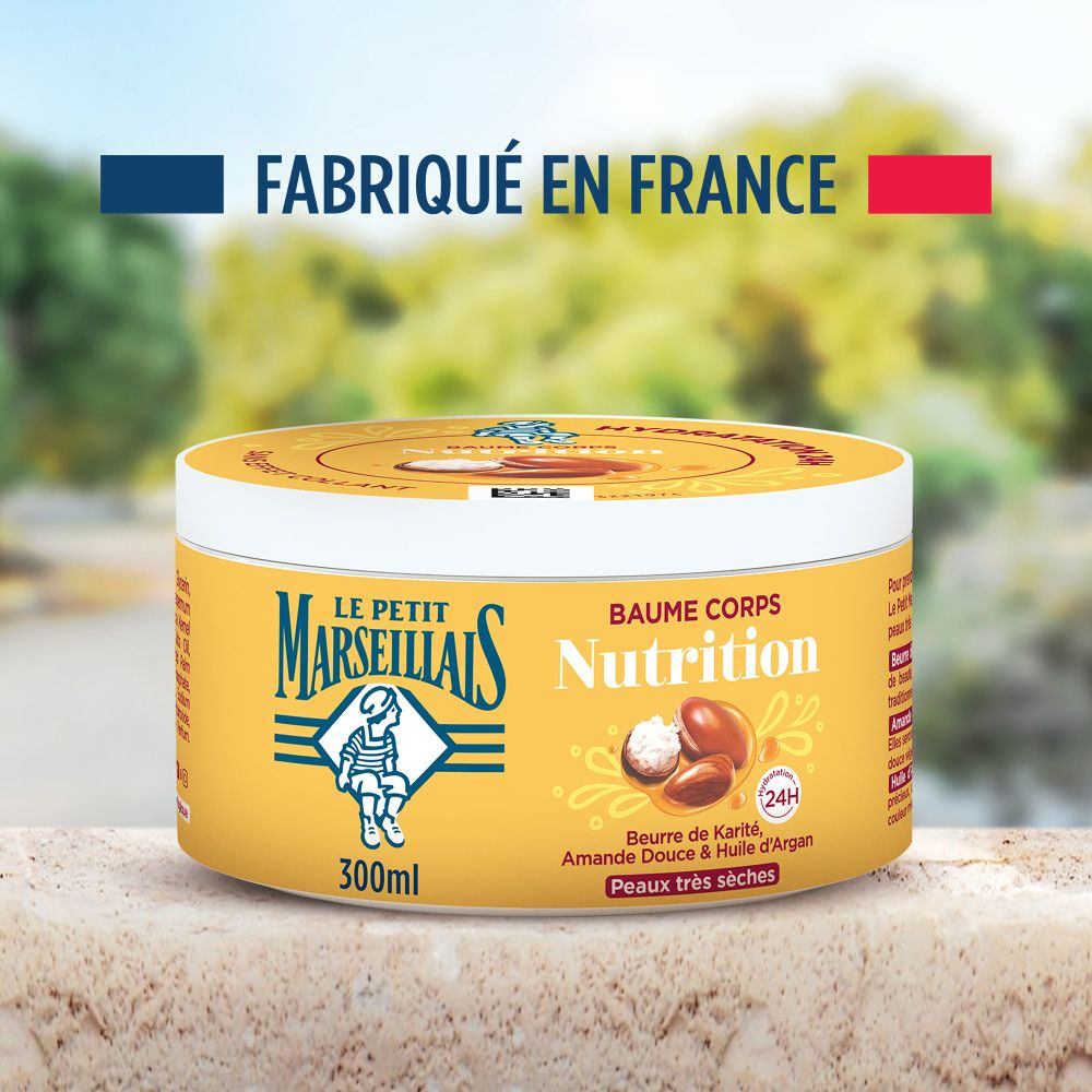 Pot jaune avec couvercle blanc. Inscription: Le Petit Marseillais, Baume Corps Nutrition. Fabriqué en France.