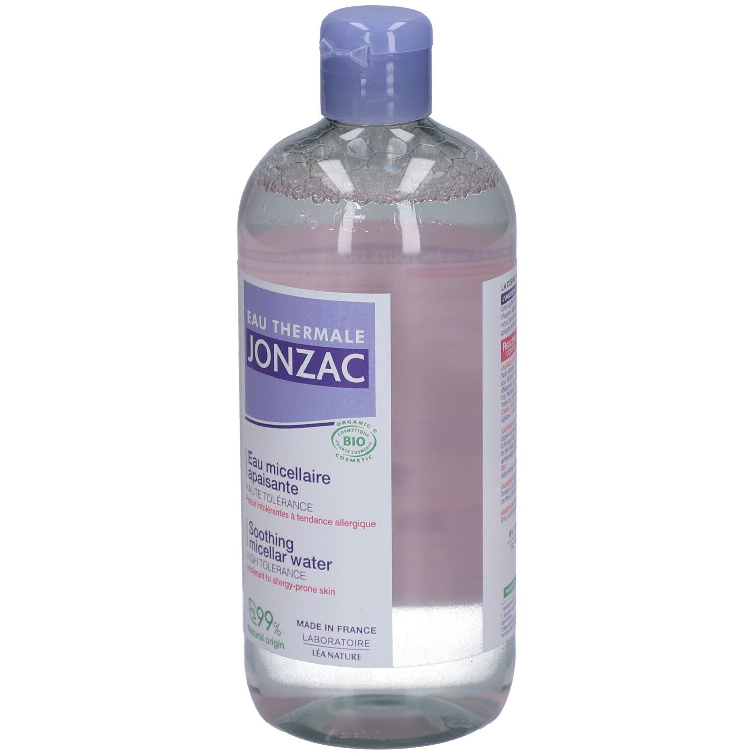 Fles, licht schuin. Etiket met productinformatie. Bio-label. Franse en Engelse teksten.