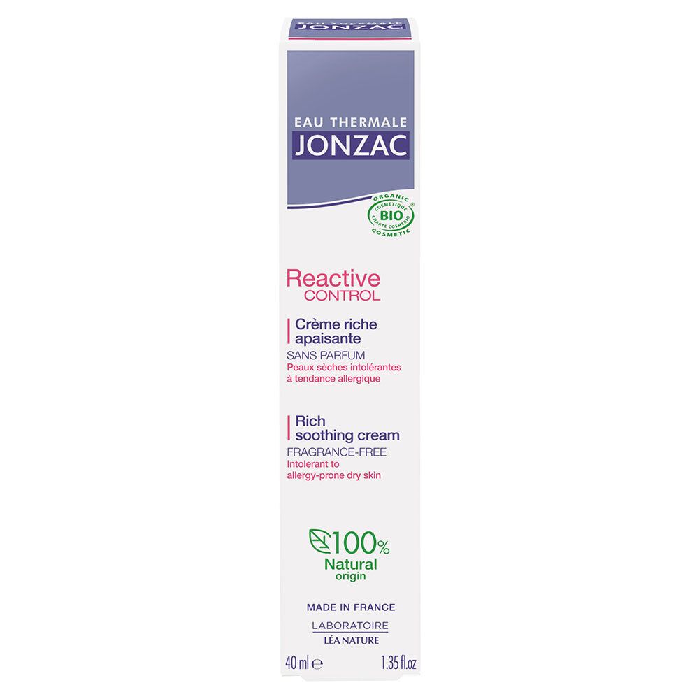 Emballage Jonzac Reactive Control. Boîte rectangulaire avec éléments violets et blancs. Texte: Reactive Control, Crème riche apaisante.