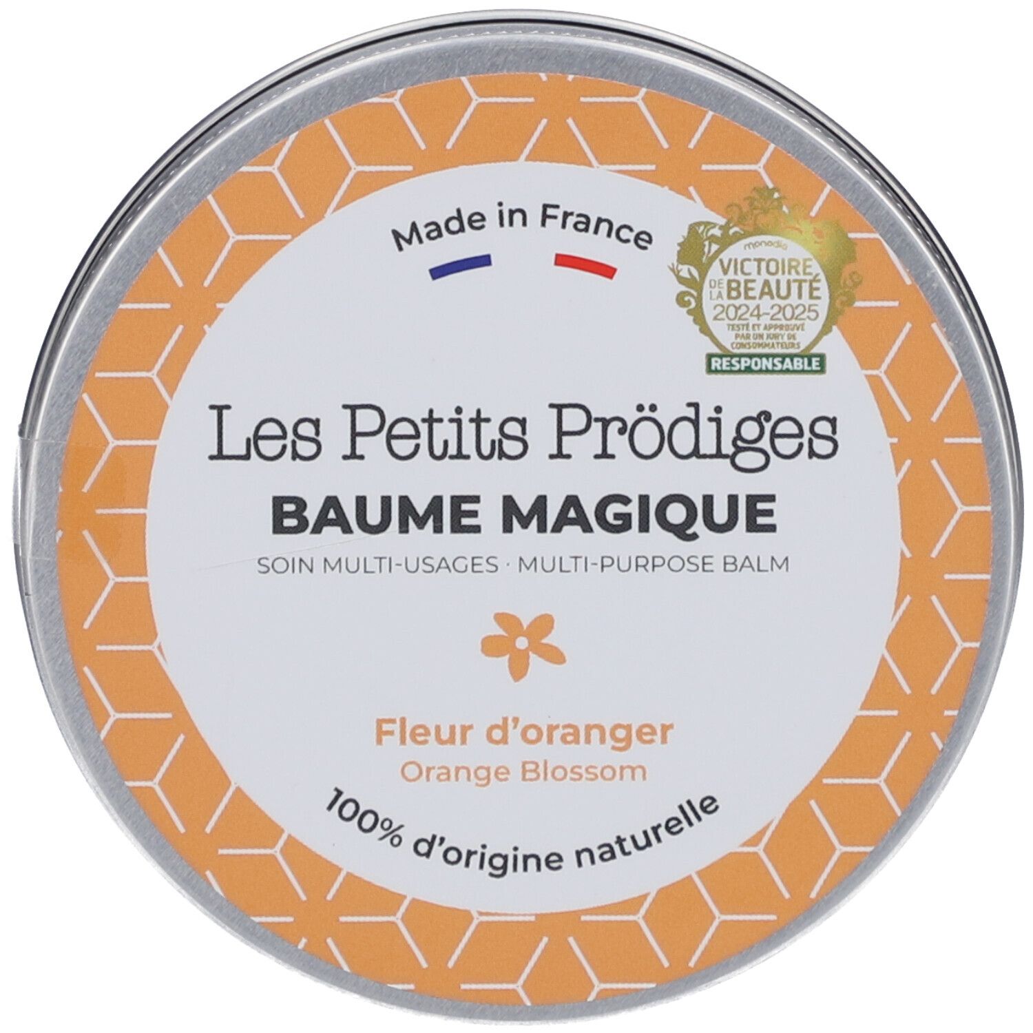Boîte ronde avec couvercle. Inscription: Les Petits Prödiges, Baume Magique, Fleur d'oranger. Sceau: Made in France, Responsible.