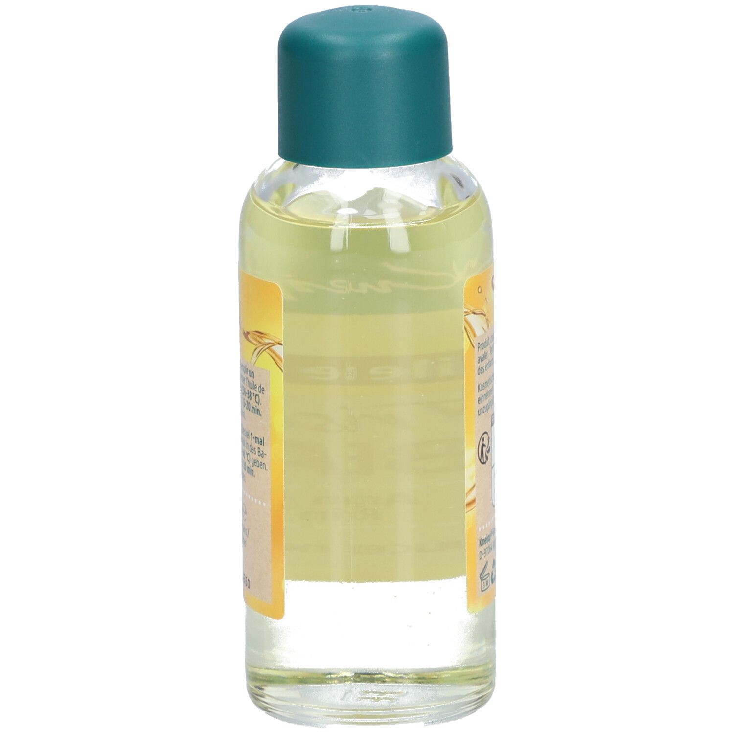 Achterkant van de Kneipp Huile de bain fles. Tekst en pictogrammen. Fabrikantenadres.