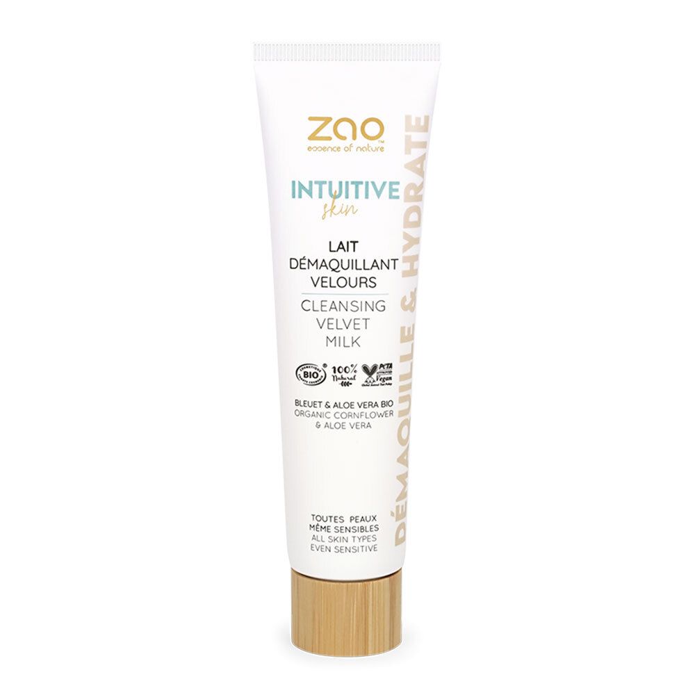 Tube blanc avec nom et logo du produit. Bouchon couleur bois. Texte: Lait Démaquillant Velours, Intuitive Skin, Demaquille & Hydrate.