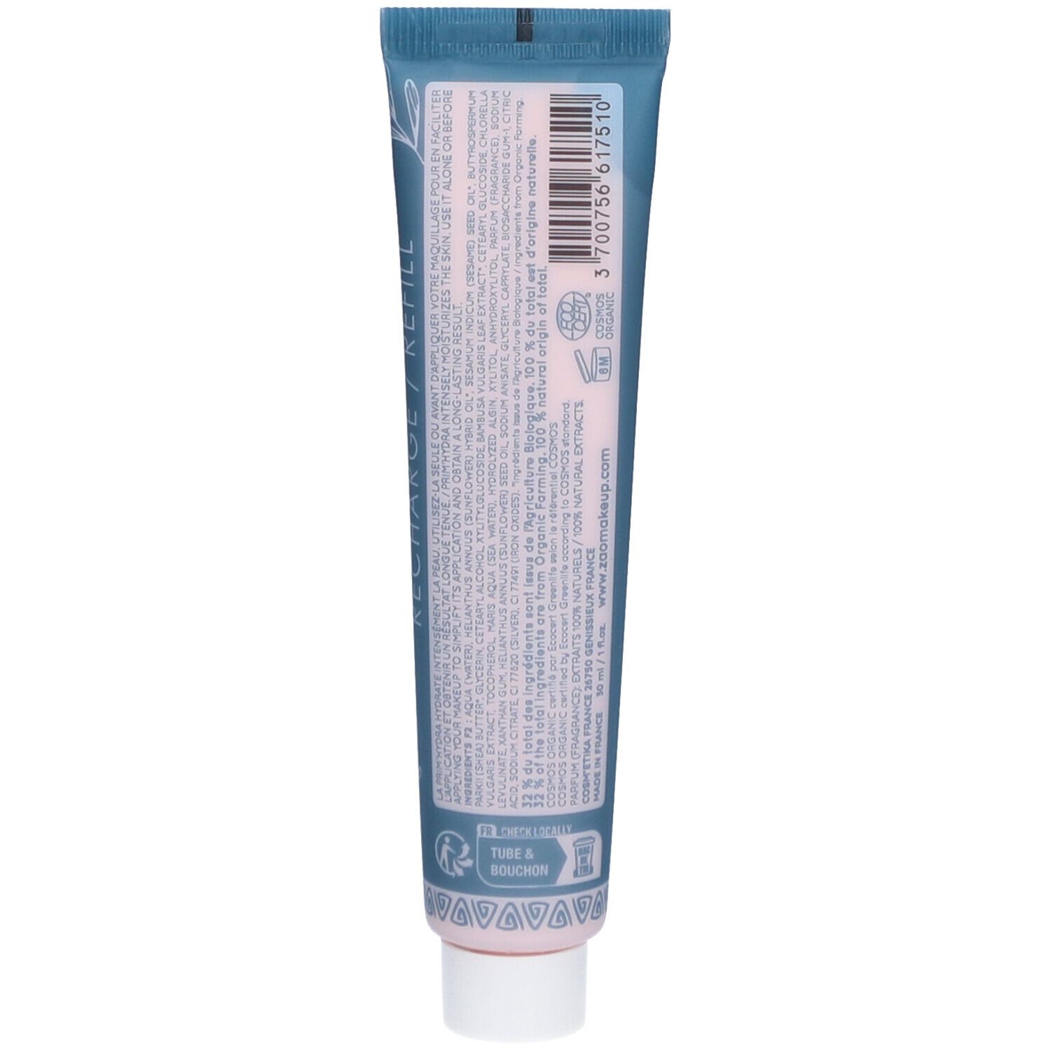 Achterkant van de PRIM'HYDRA tube. Tekst en ingrediënten in meerdere talen. Roze inhoud zichtbaar. Vegan logo.