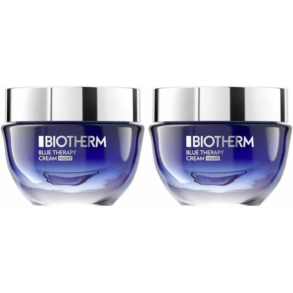 Deux pots de crème bleue. Inscription: Biotherm Blue Therapy Cream Night.