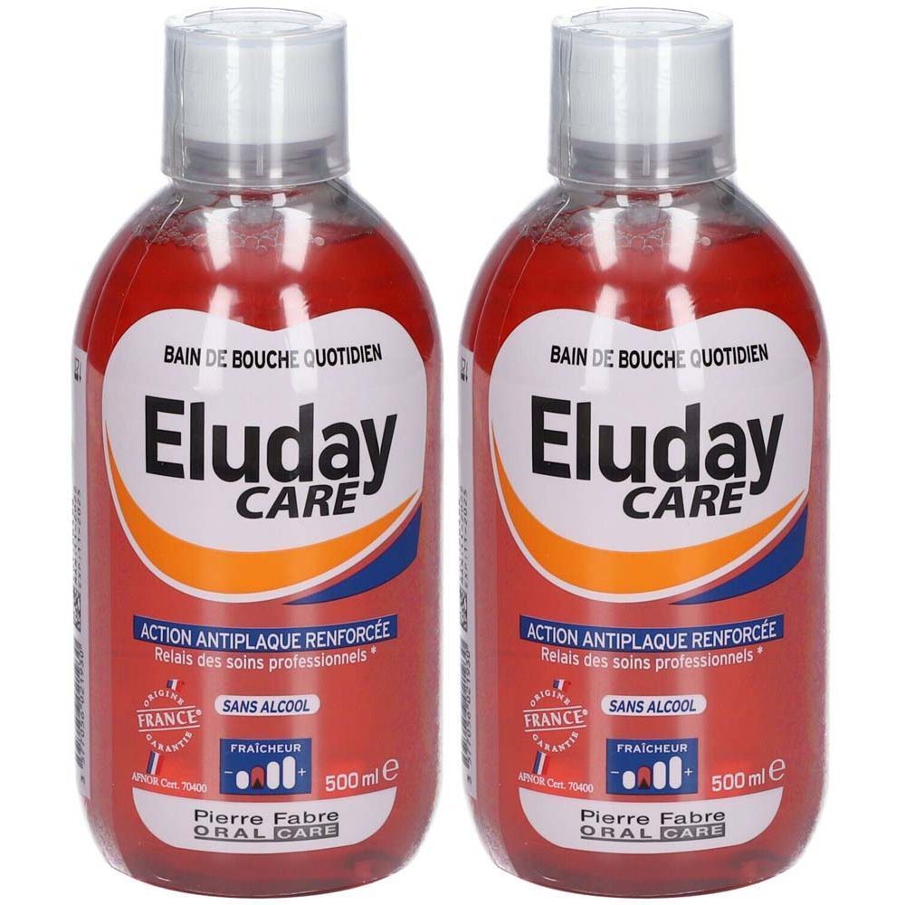 Twee flessen Eluday CARE mondwater. Rode vloeistof, witte dop. Opschriften: "ACTION ANTIPLAQUE RENFORCEE", "SANS ALCOOL", "500 ml e".