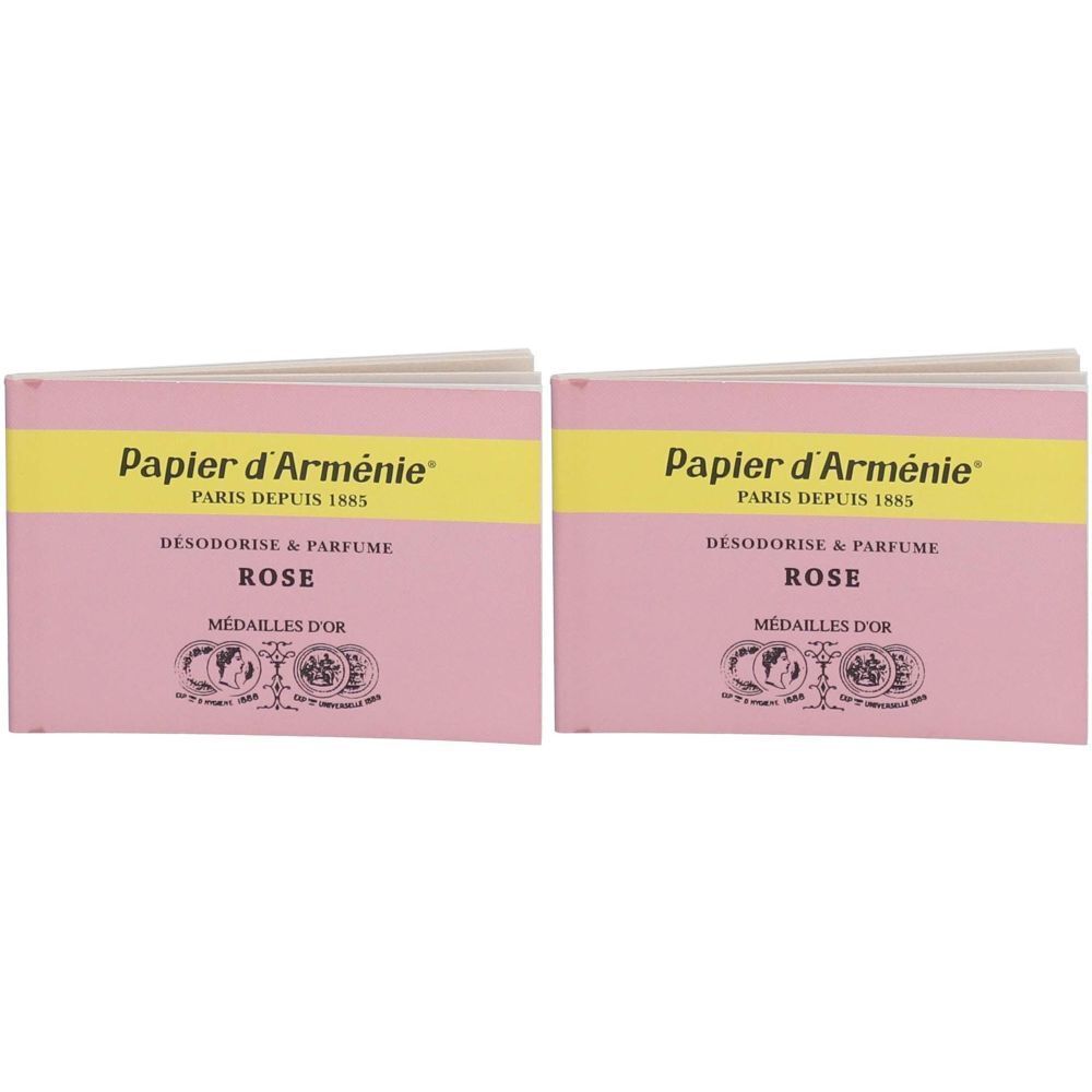 Twee verpakkingen Papier d'Arménie La Rose. Roze verpakking met gele streep en tekst: Désodorise & Parfume, Rose, Médailles d'Or.