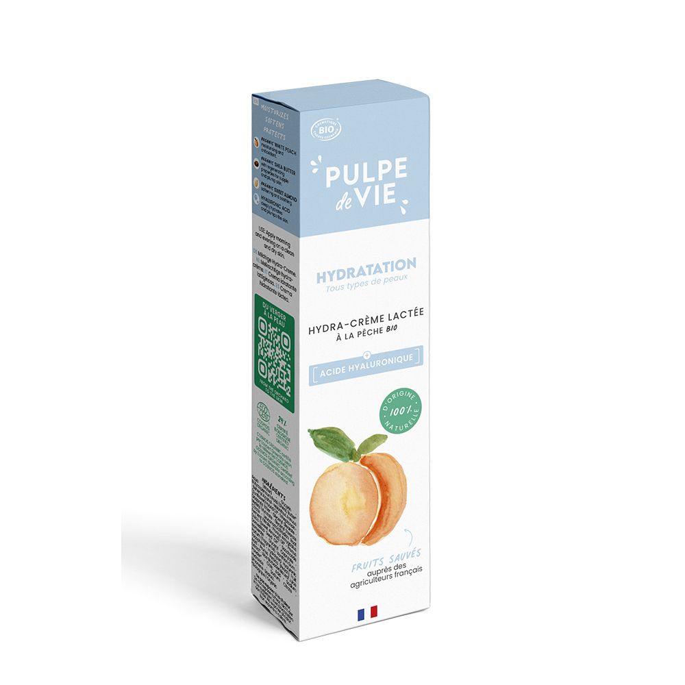 Kartonnen verpakking, blauw en wit. Opschrift: PULPE DE VIE, Hydratation, Hydra-Crème lactée à la pêche. Bio-certificering.