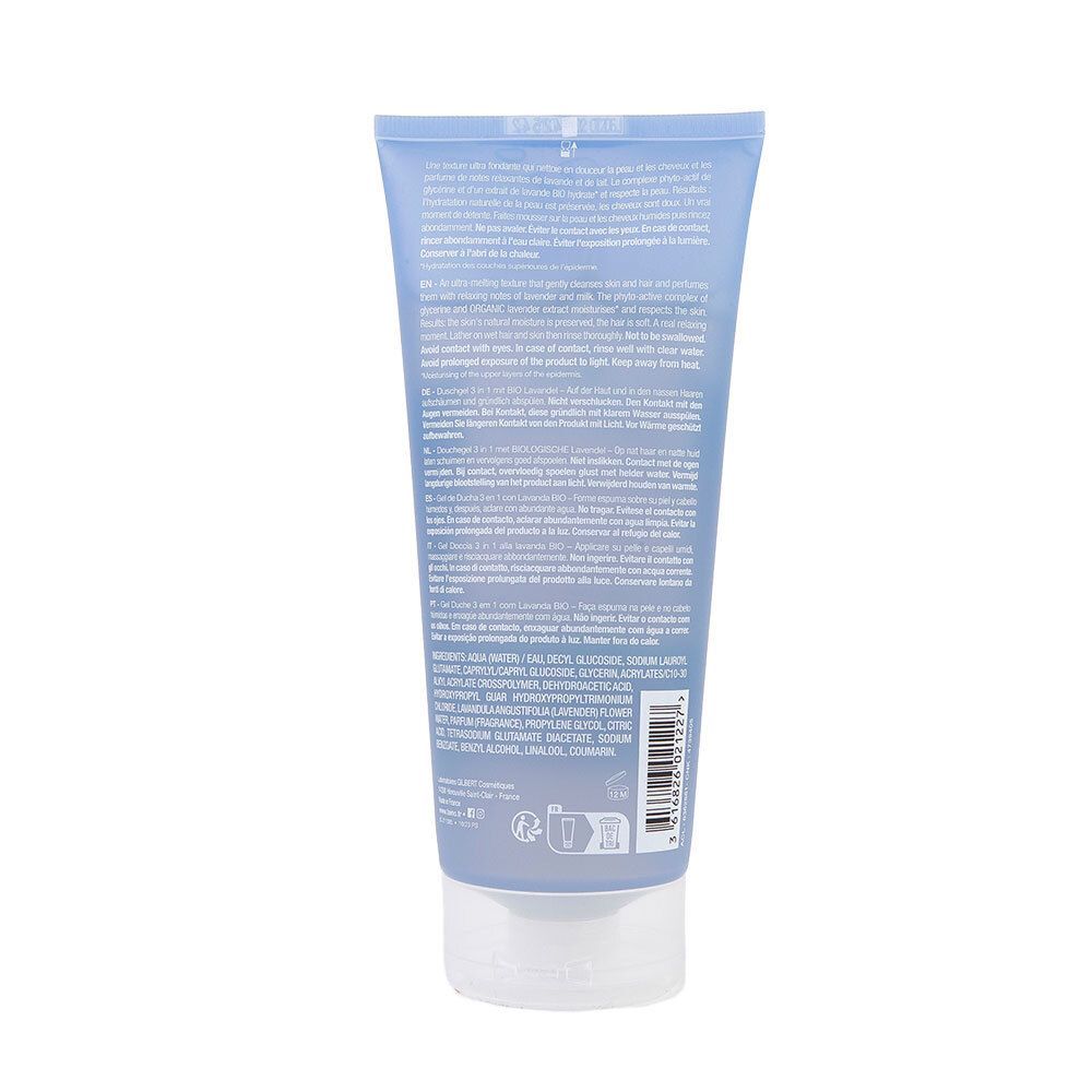 Achterkant van een blauw-paarse tube. Meertalige tekst. Ingrediënten, gebruiksaanwijzing en fabrikantinfo.