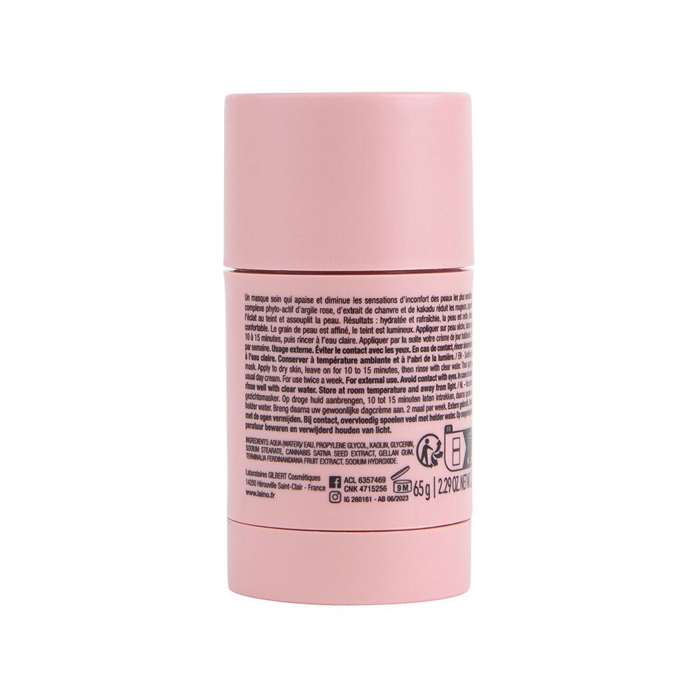 Achterkant van de roze gezichtsmasker stick. Tekst met ingrediënten en gebruik. Gewicht: 65g / 2.29 oz.