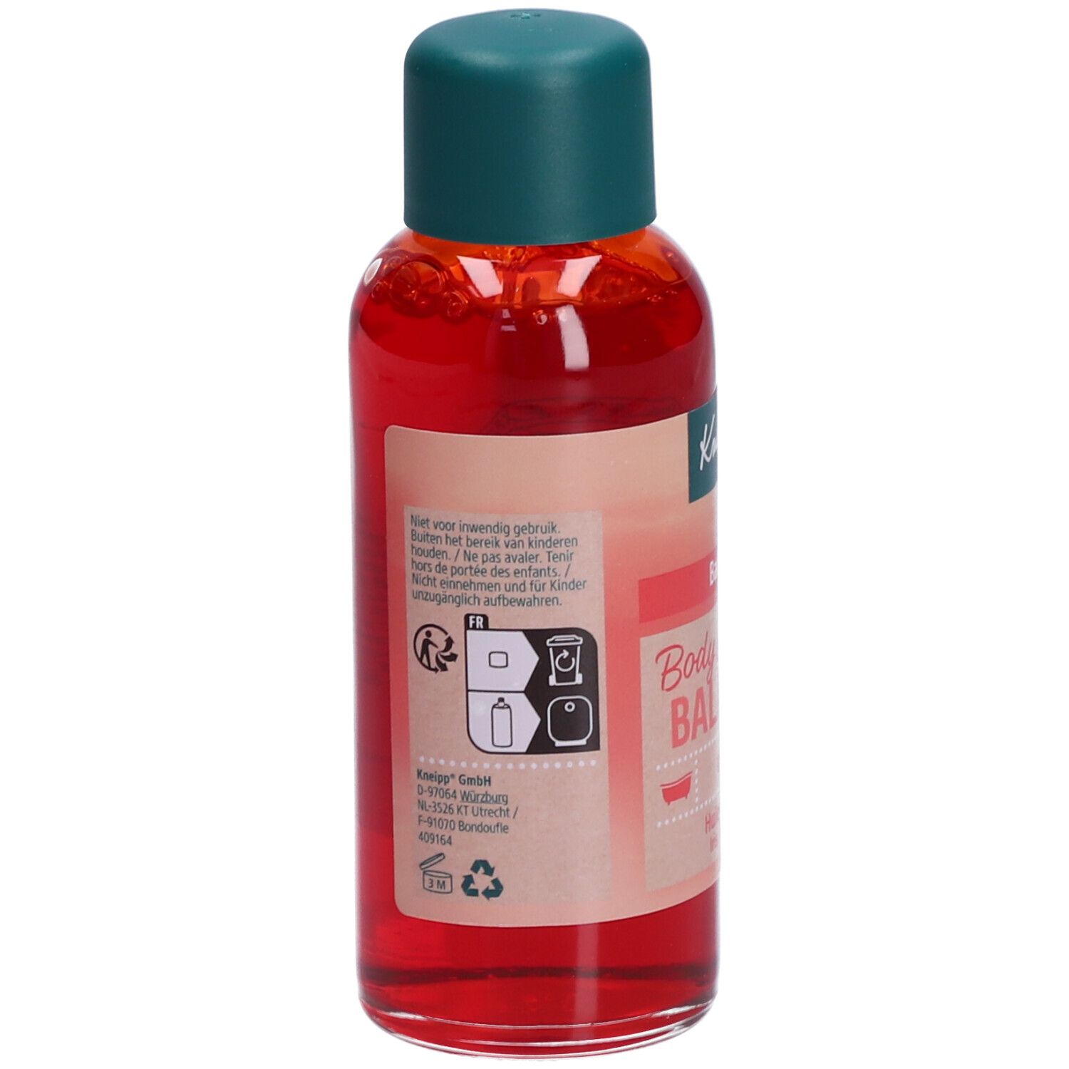 Dos du flacon d'huile de bain Kneipp. Liquide rouge, bouchon vert. Texte et pictogrammes sur l'étiquette.