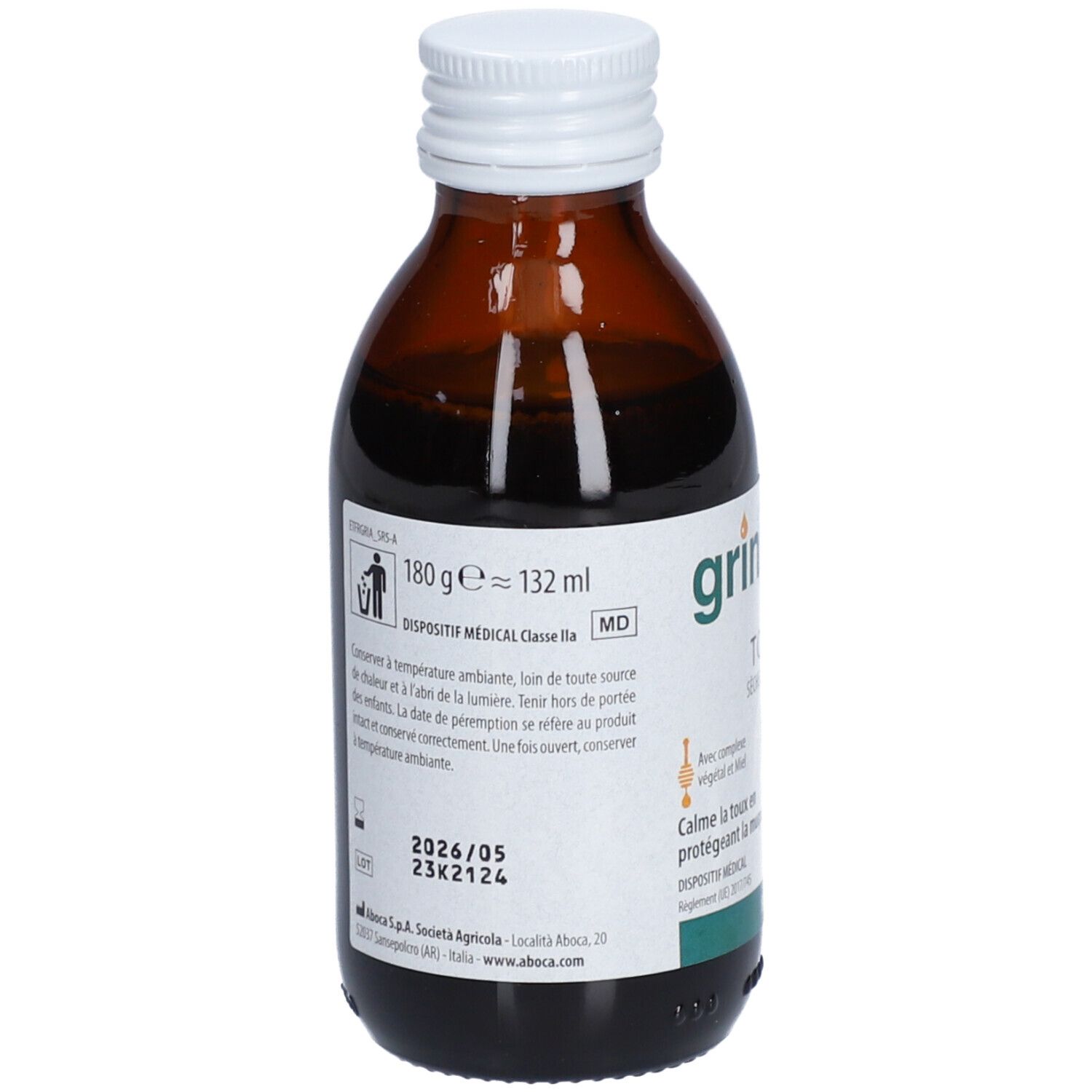 Achterkant van bruine glazen fles met witte dop. Etiket met informatie en tekst. Medisch hulpmiddel.
