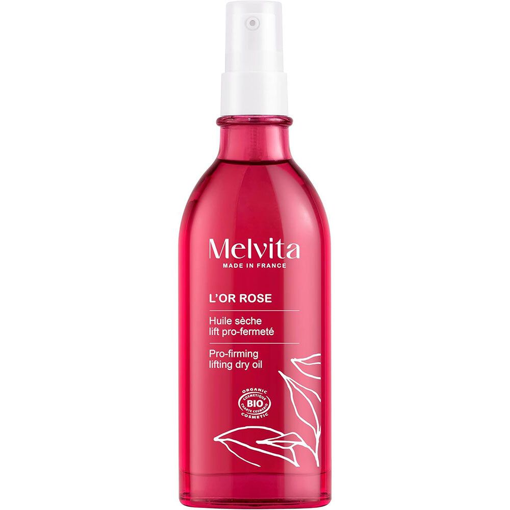 Flacon en verre rouge avec vaporisateur. Inscription: Melvita, L'Or Rose, Huile sèche lift pro-fermeté, Pro-firming lifting dry oil. Certification bio.