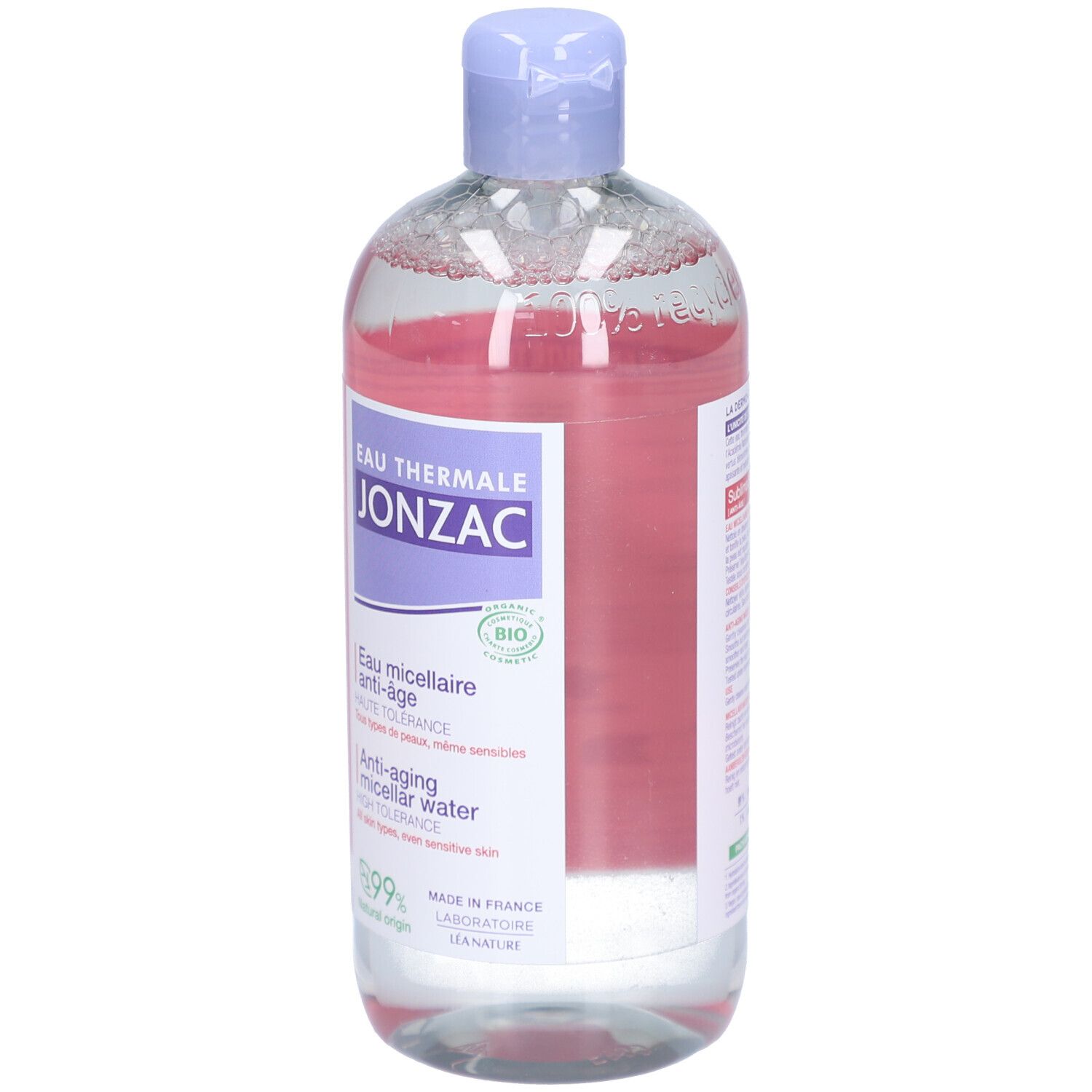 Flacon d'eau micellaire Jonzac. Étiquettes violettes et blanches, bouchon bleu. Anti-âge, peaux sensibles.