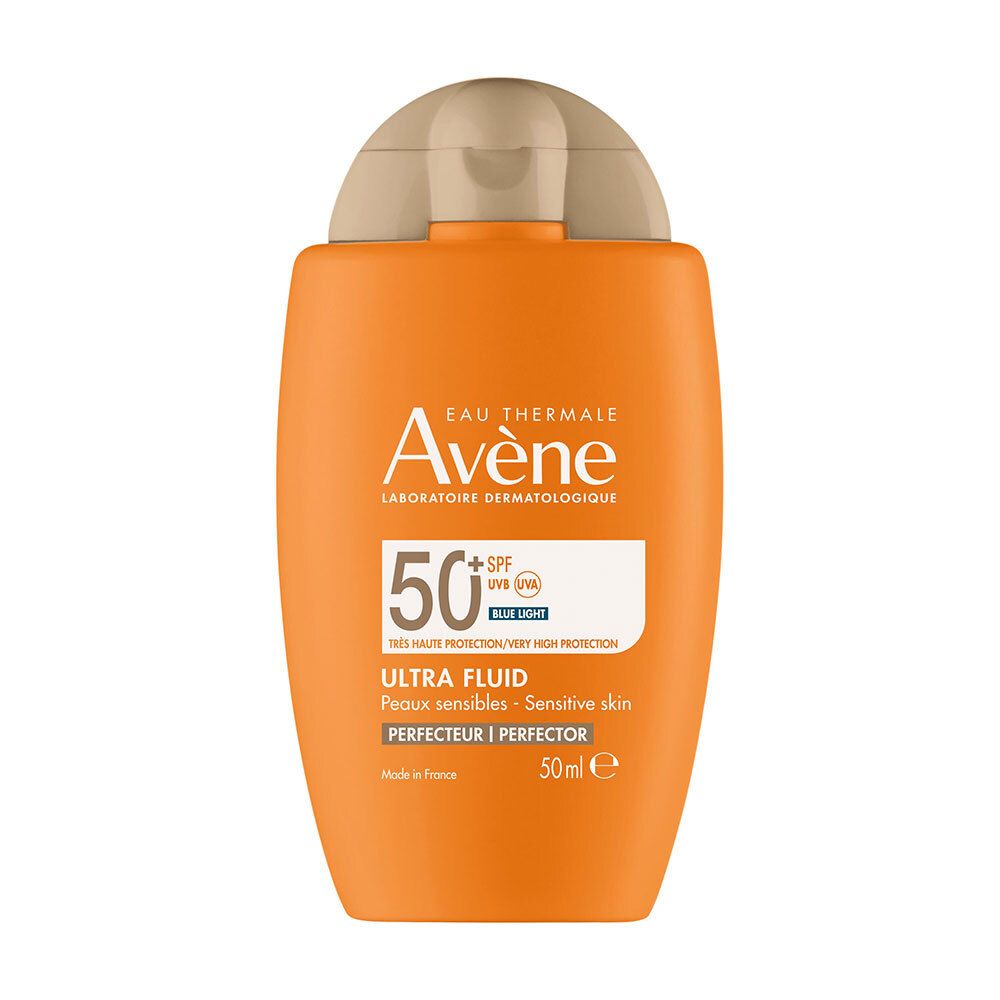 Oranje fles met wit etiket. Tekst: Avène, 50+ SPF, Ultra Fluid, Perfecteur. 50ml.