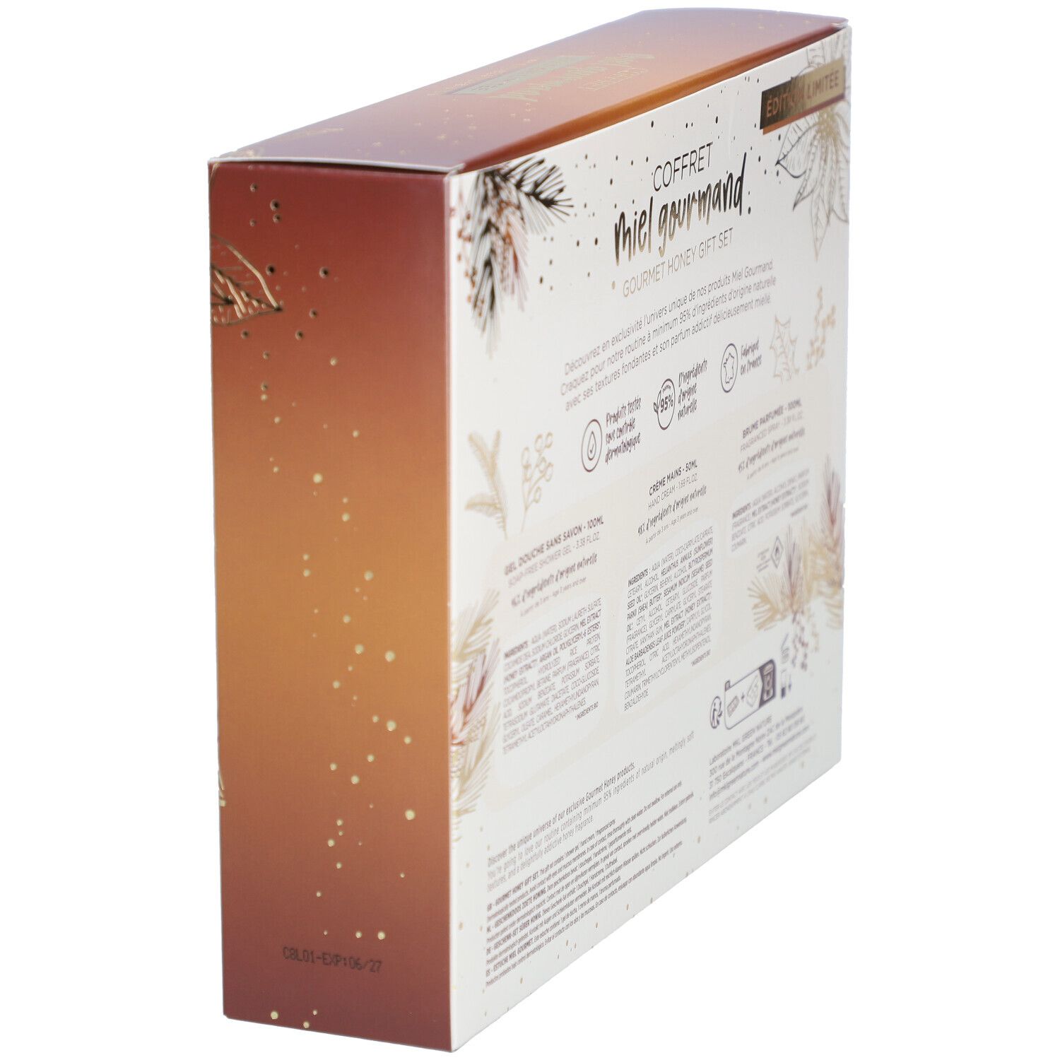 Vue latérale du coffret cadeau. Nom du produit et ingrédients visibles au dos. Design floral.