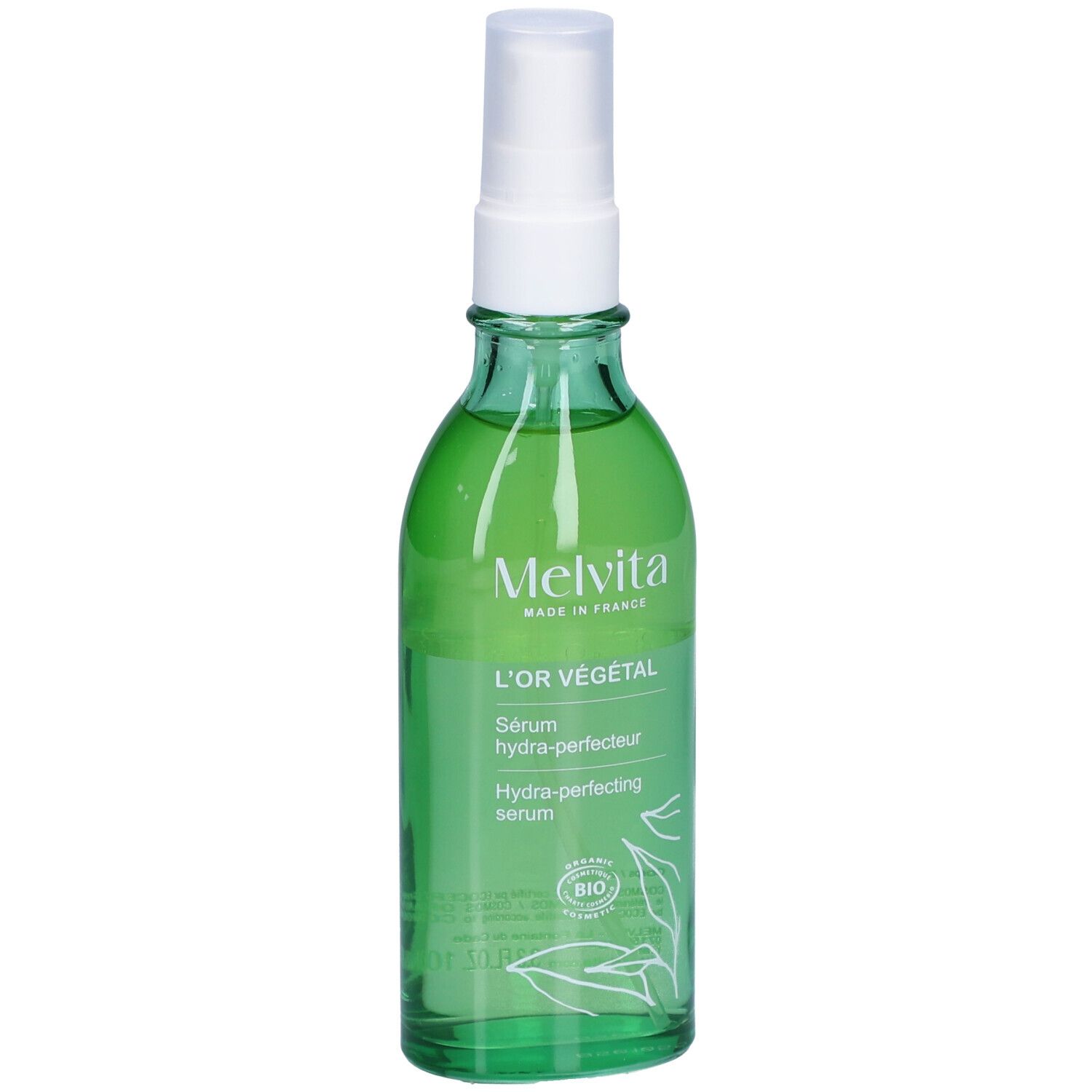 Groene glazen fles met verstuiver. Opschrift: L'OR VÉGÉTAL, Sérum hydra-perfecteur, Hydra-perfecting serum. Bio-certificering.