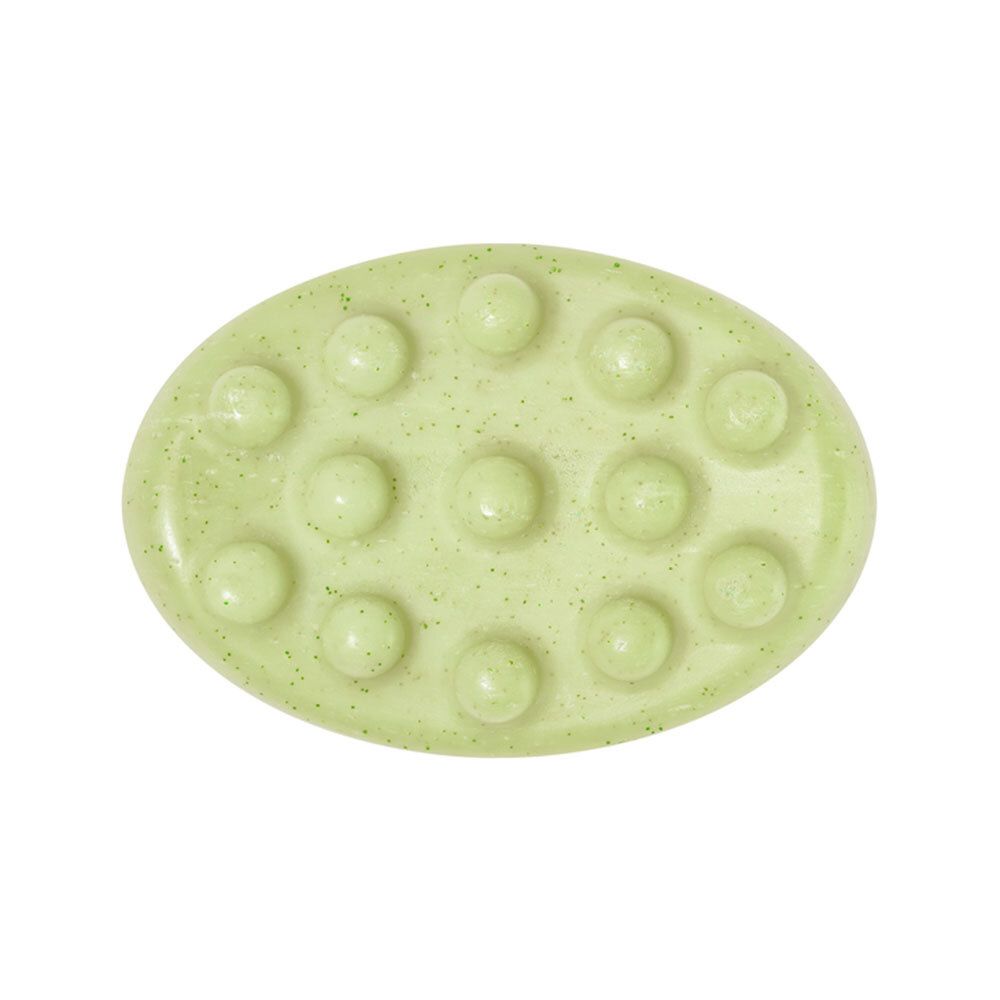 Savon ovale vert clair avec 12 billes en relief. Surface parsemée de petits points.