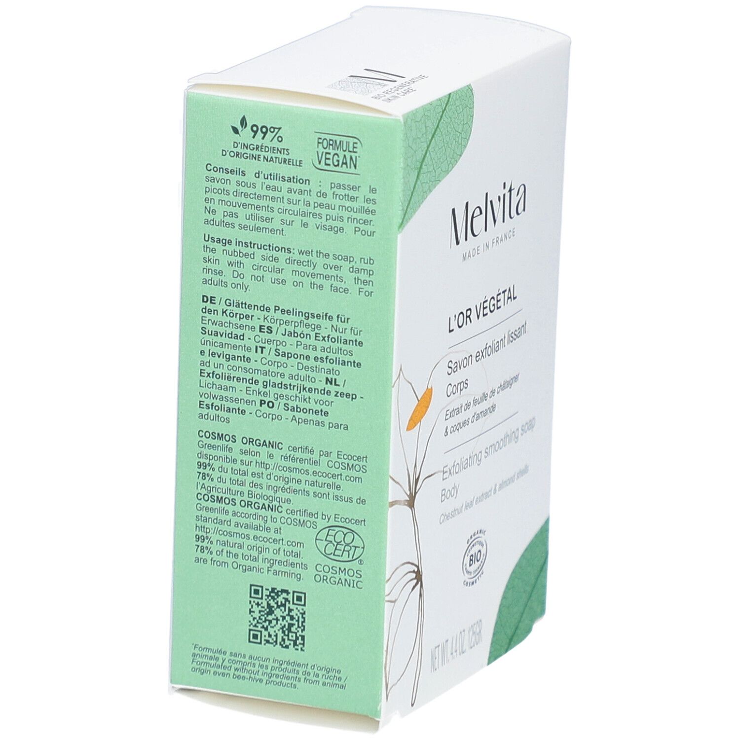 Boîte blanche avec informations produit. Texte : L'Or Végétal, Savon exfoliant lissant Corps. 99% ingrédients d'origine naturelle.