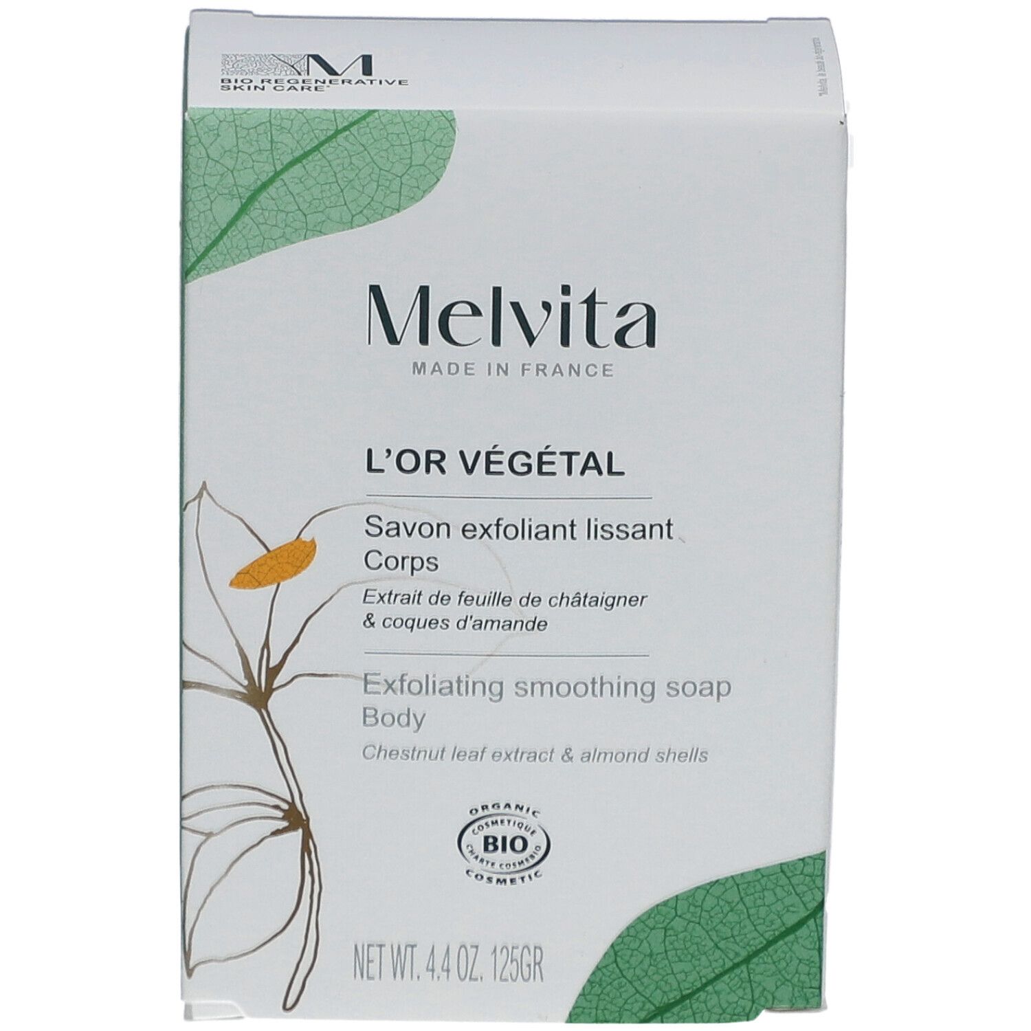 Boîte blanche avec nom et logo du produit. Texte : L'Or Végétal, Savon exfoliant lissant Corps. Certification Bio.
