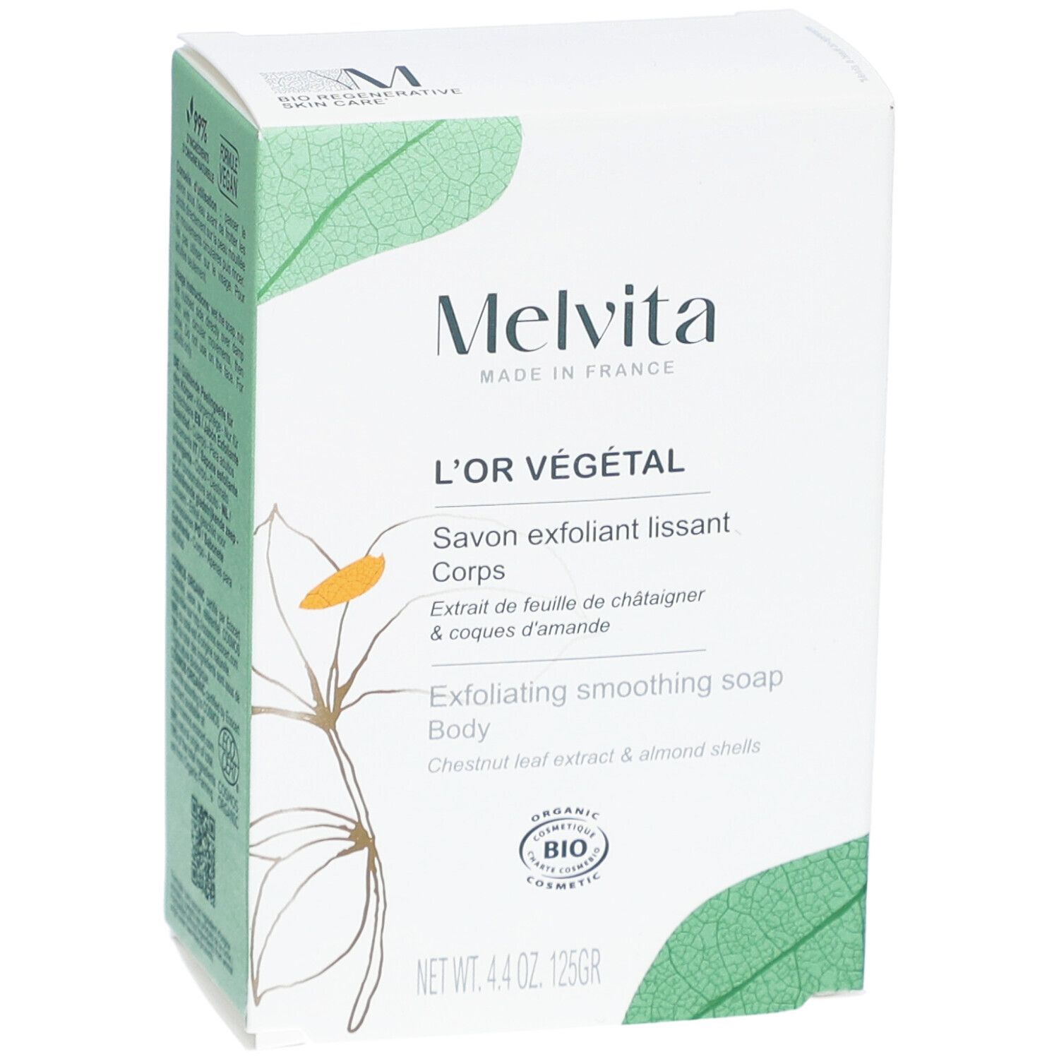 Boîte blanche avec nom et logo du produit. Texte : L'Or Végétal, Savon exfoliant lissant Corps. Certification Bio.