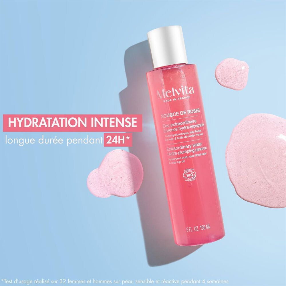 Rozen essence fles met witte dop. Tekst: Hydratation intense, longue durée pendant 24H.