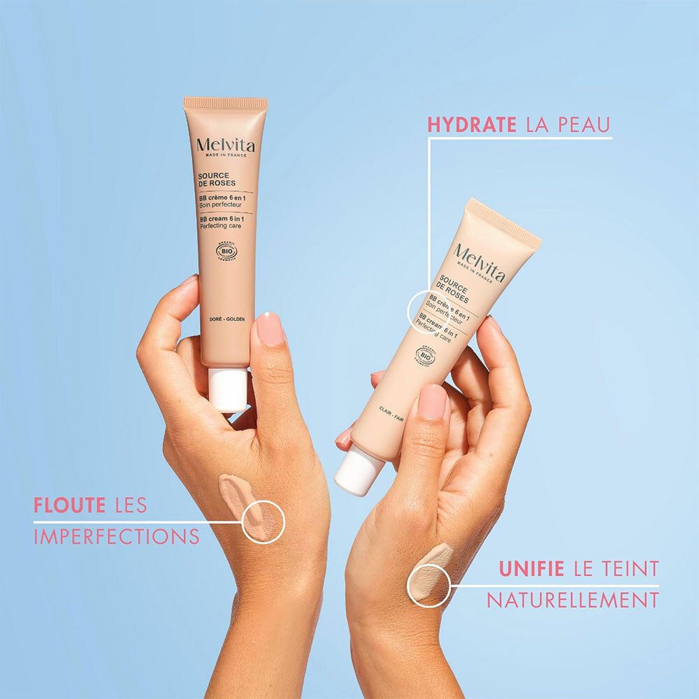 Handen houden twee BB crème tubes vast. Tekst: Hydrate la peau, Floute les imperfections, Unifie le teint naturellement.