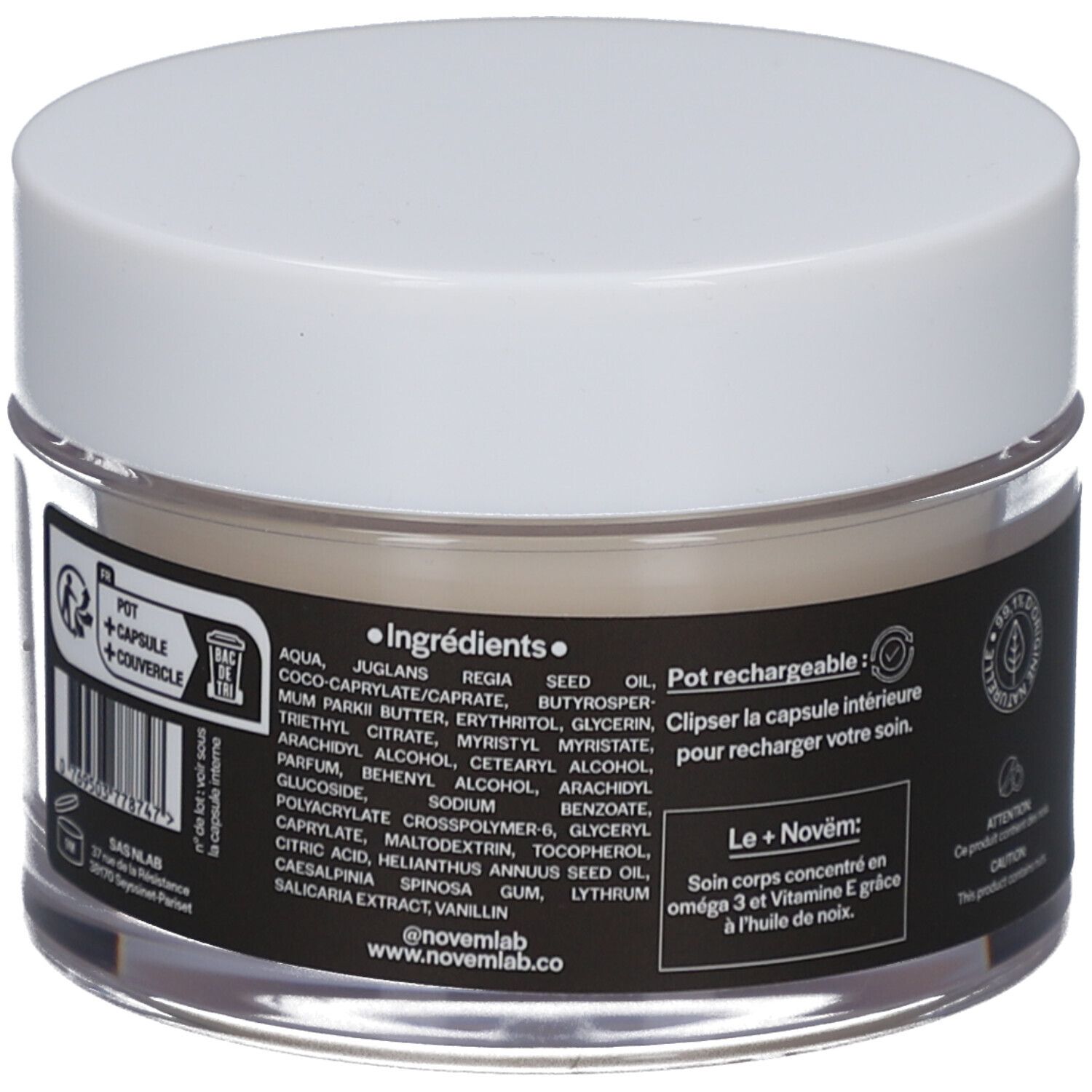 Achterkant van de crèmepot. Zwart etiket met ingrediënten en tekst: Pot rechargeable, Le+Novëm. Witte deksel, transparant glas.