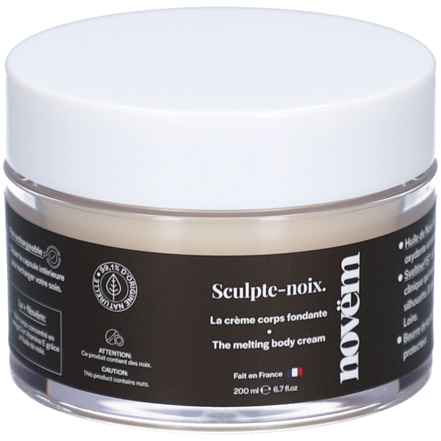 Crèmepot. Witte deksel, transparant glas. Zwart etiket met tekst: Sculpt-noix, La crème corps fondante, novëm. 200 ml.