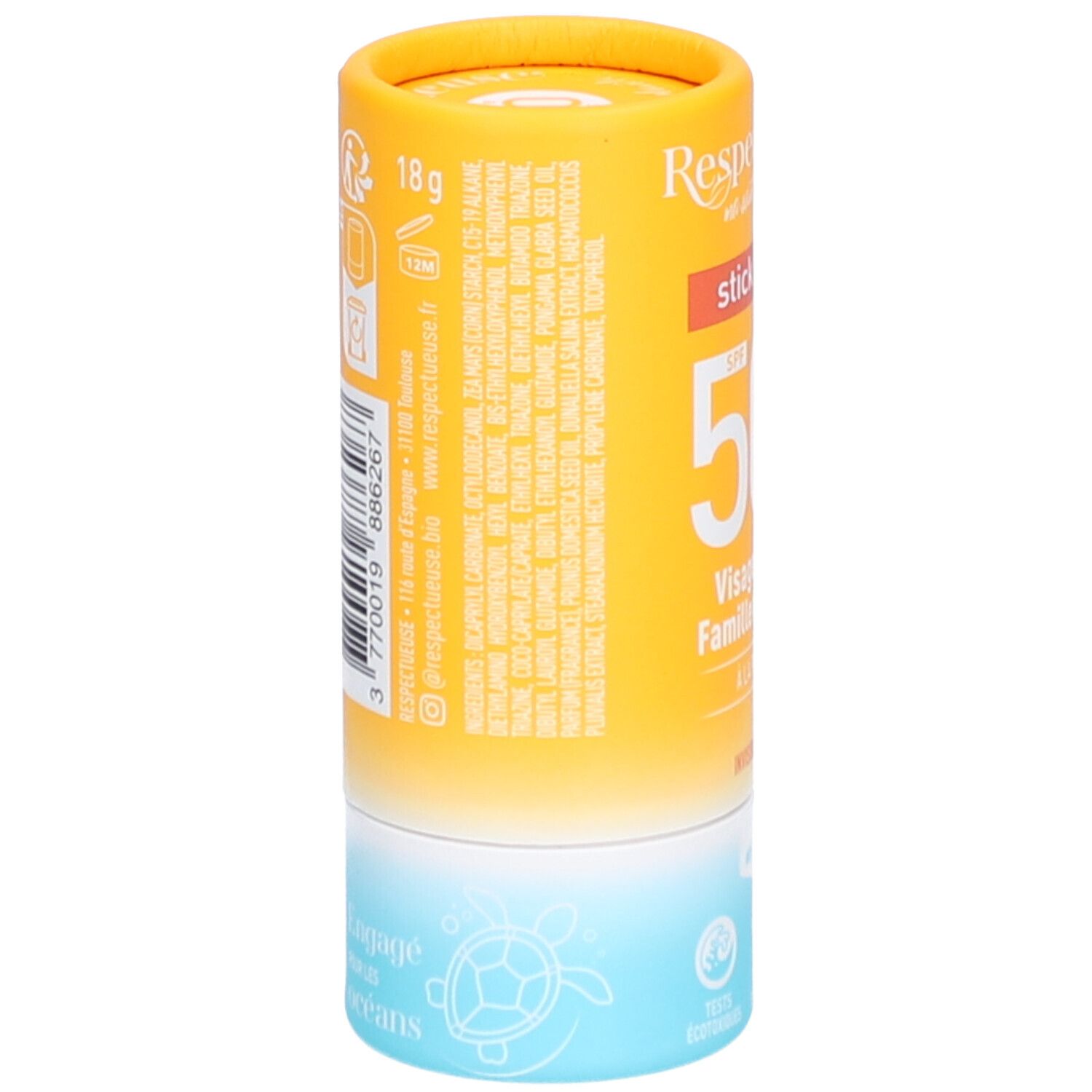 Stick solaire cylindrique. Emballage jaune-orangé avec informations produit et ingrédients. 18g. Informations de fabrication.