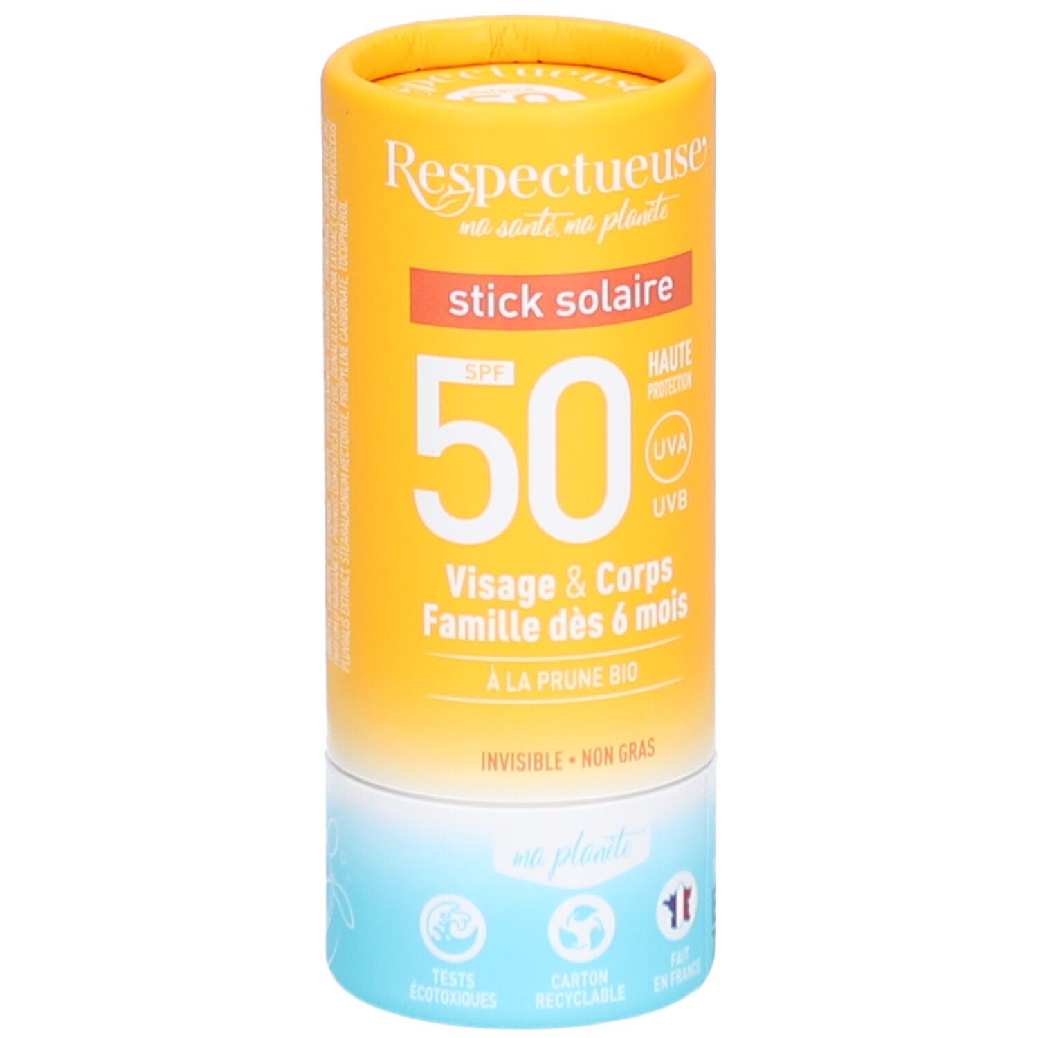 Stick solaire cylindrique. Emballage jaune-orangé avec informations produit et SPF 50. Pour visage et corps, dès 6 mois.