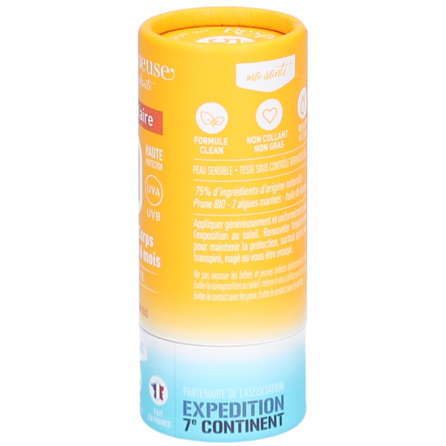 Stick solaire cylindrique. Emballage jaune-orangé avec informations produit. Formule, 75% ingrédients naturels, Expédition 7e Continent.