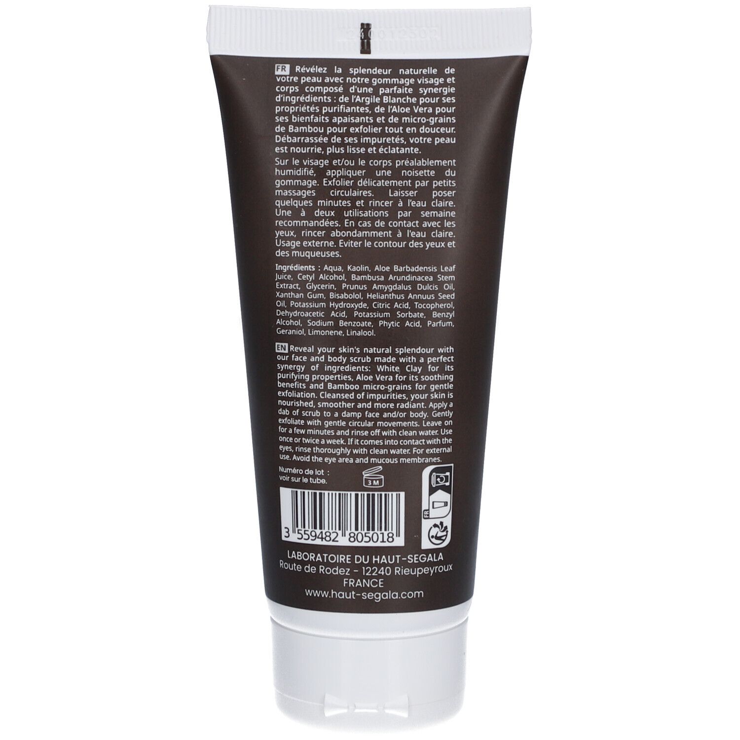 Achterkant van de lichaamsscrubtube. Tekst en ingrediënten op zwarte achtergrond. Witte dop.